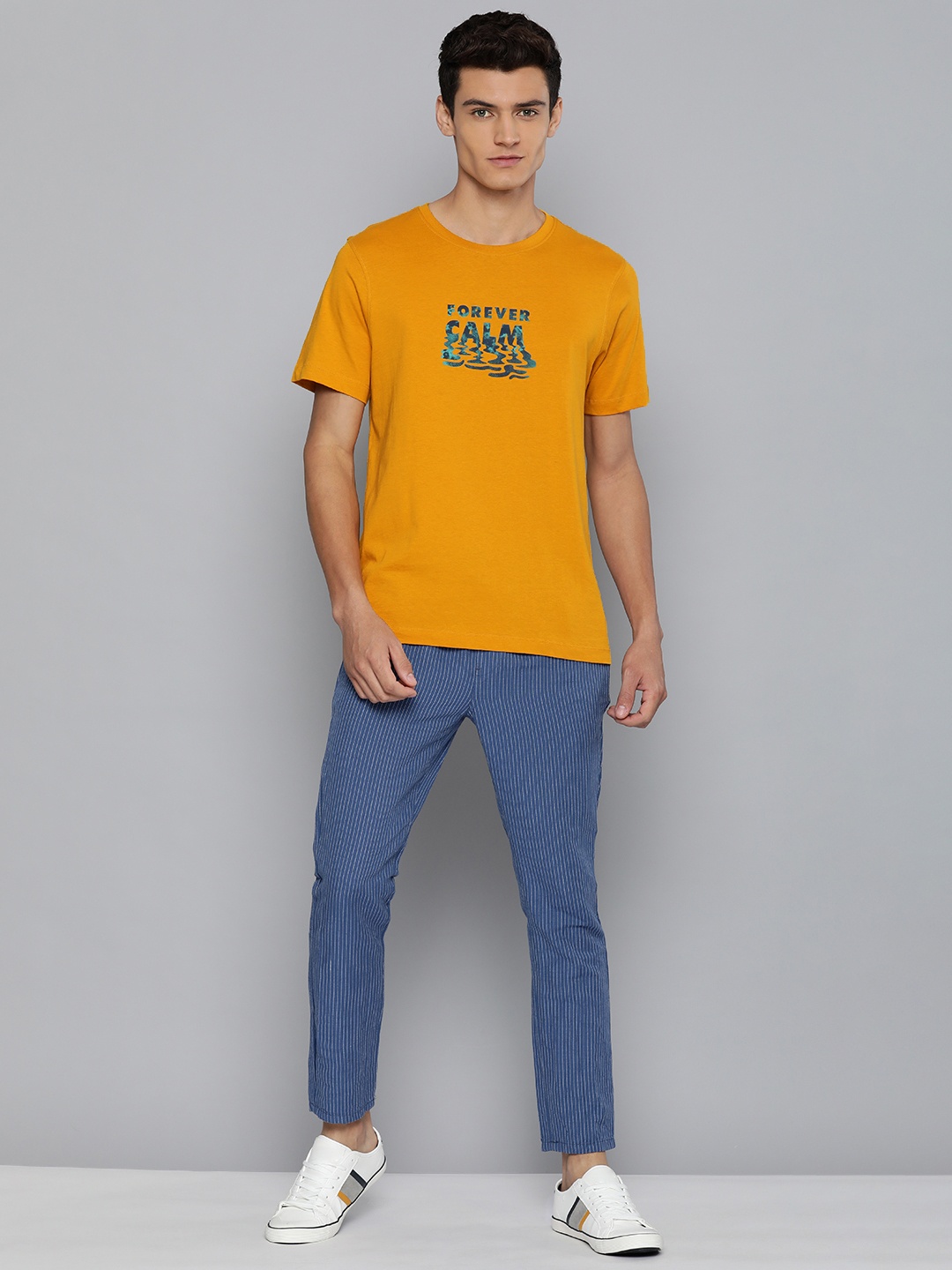 

Mast & Harbour Men Yellow Printed Slim Fit Pure Cotton Casual T-shirt