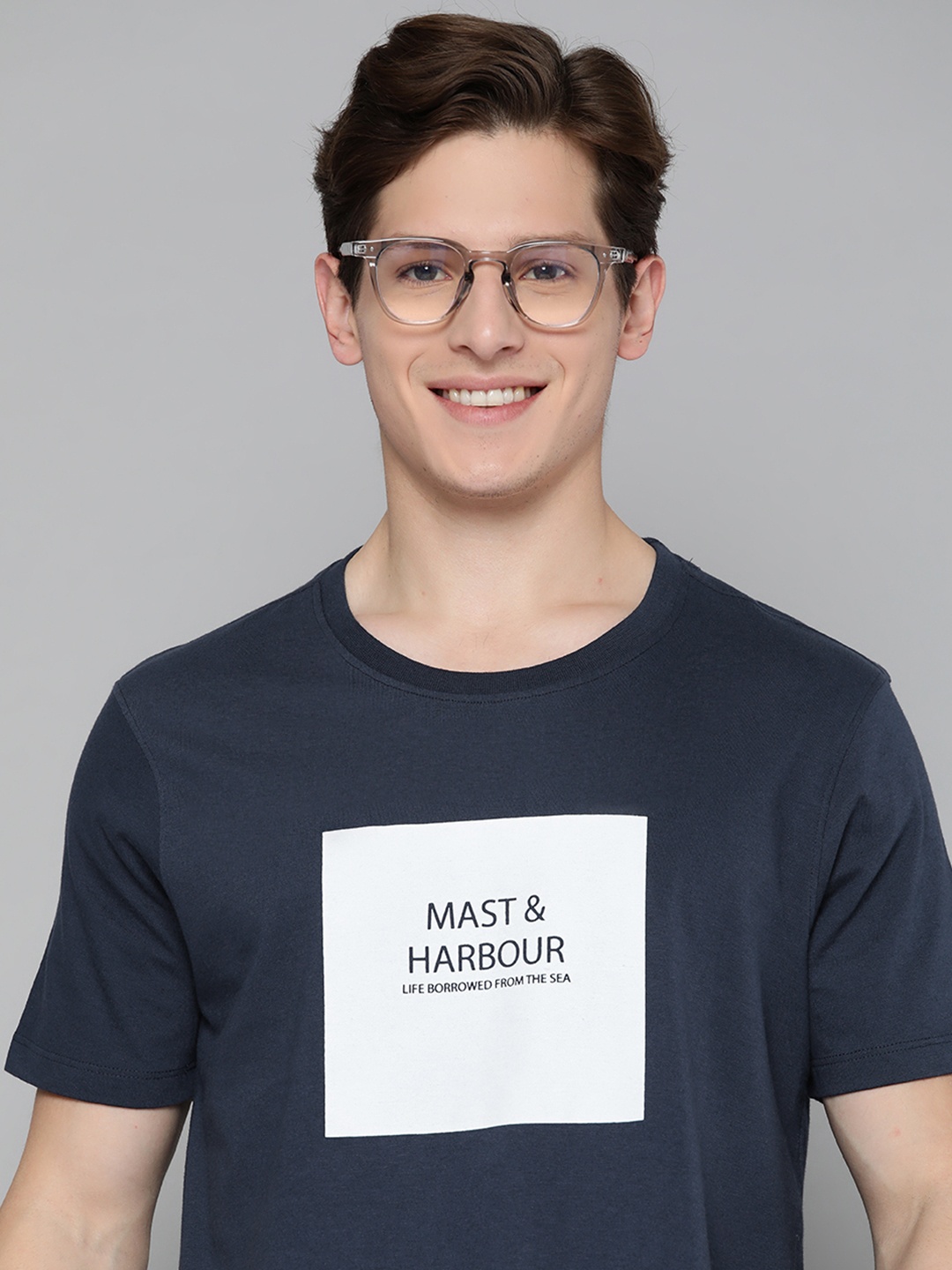 

Mast & Harbour Men Navy Blue & White Typography Donald Duck Printed T-shirt