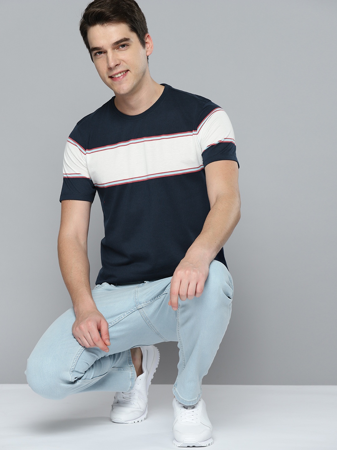 

Mast & Harbour Men Navy Blue & Off White Striped T-shirt