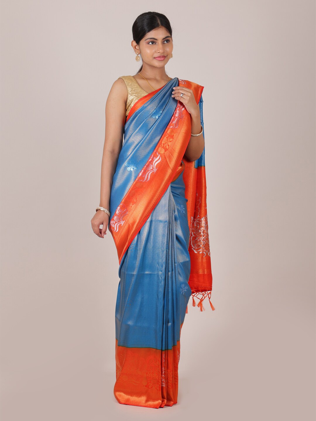 

Pothys Blue & Orange Floral Zari Art Silk Saree