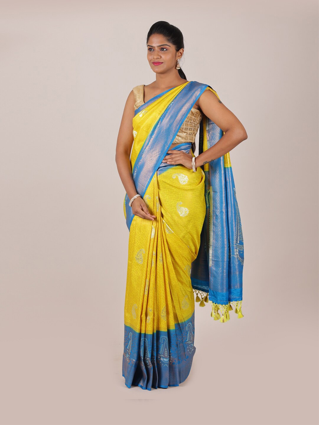 

Pothys Yellow & Blue Ethnic Motifs Zari Art Silk Banarasi Saree