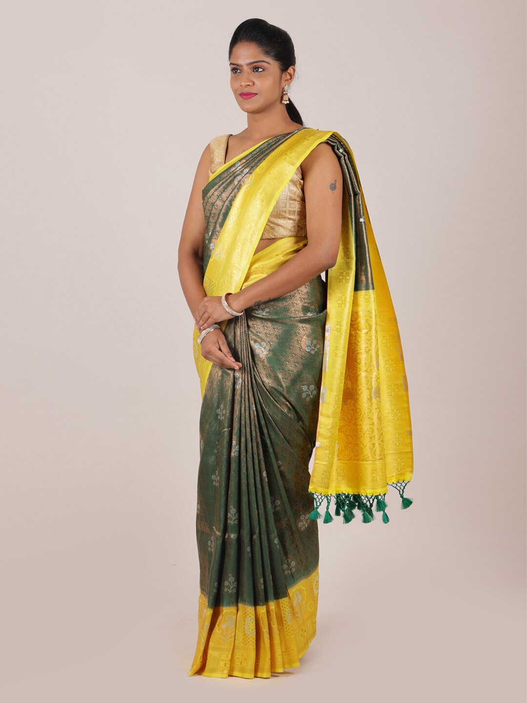 

Pothys Green & Yellow Ethnic Motifs Zari Art Silk Banarasi Saree