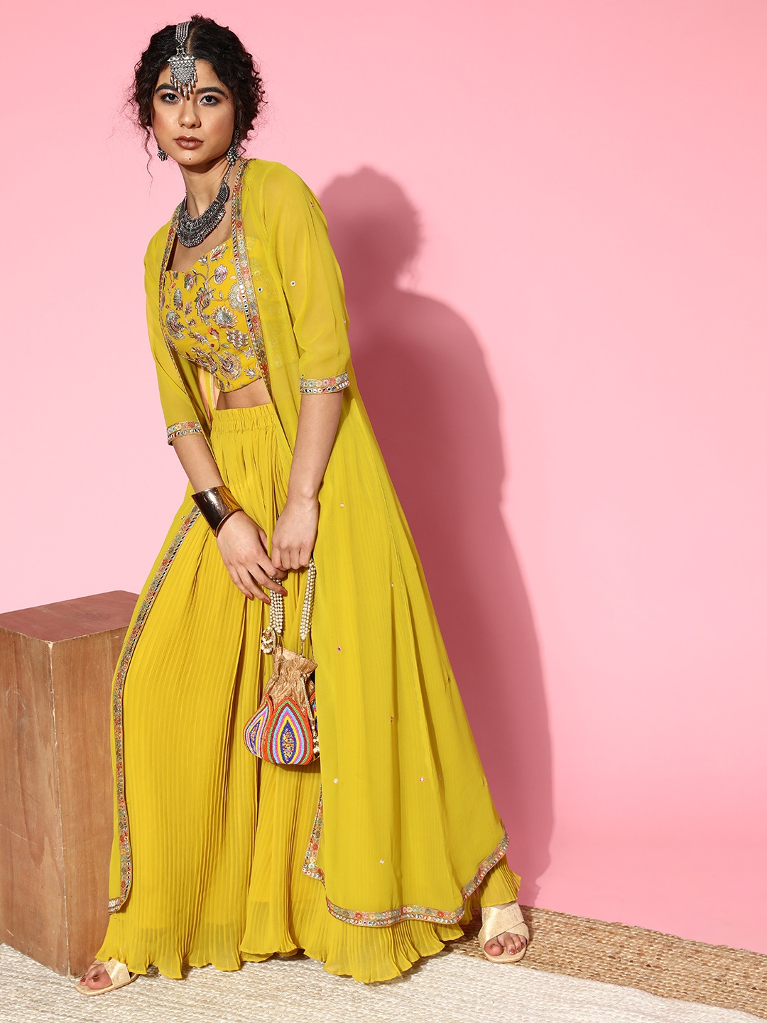 

Kvsfab Women Elegant Mustard Self-Design Top with Solid Palazzos