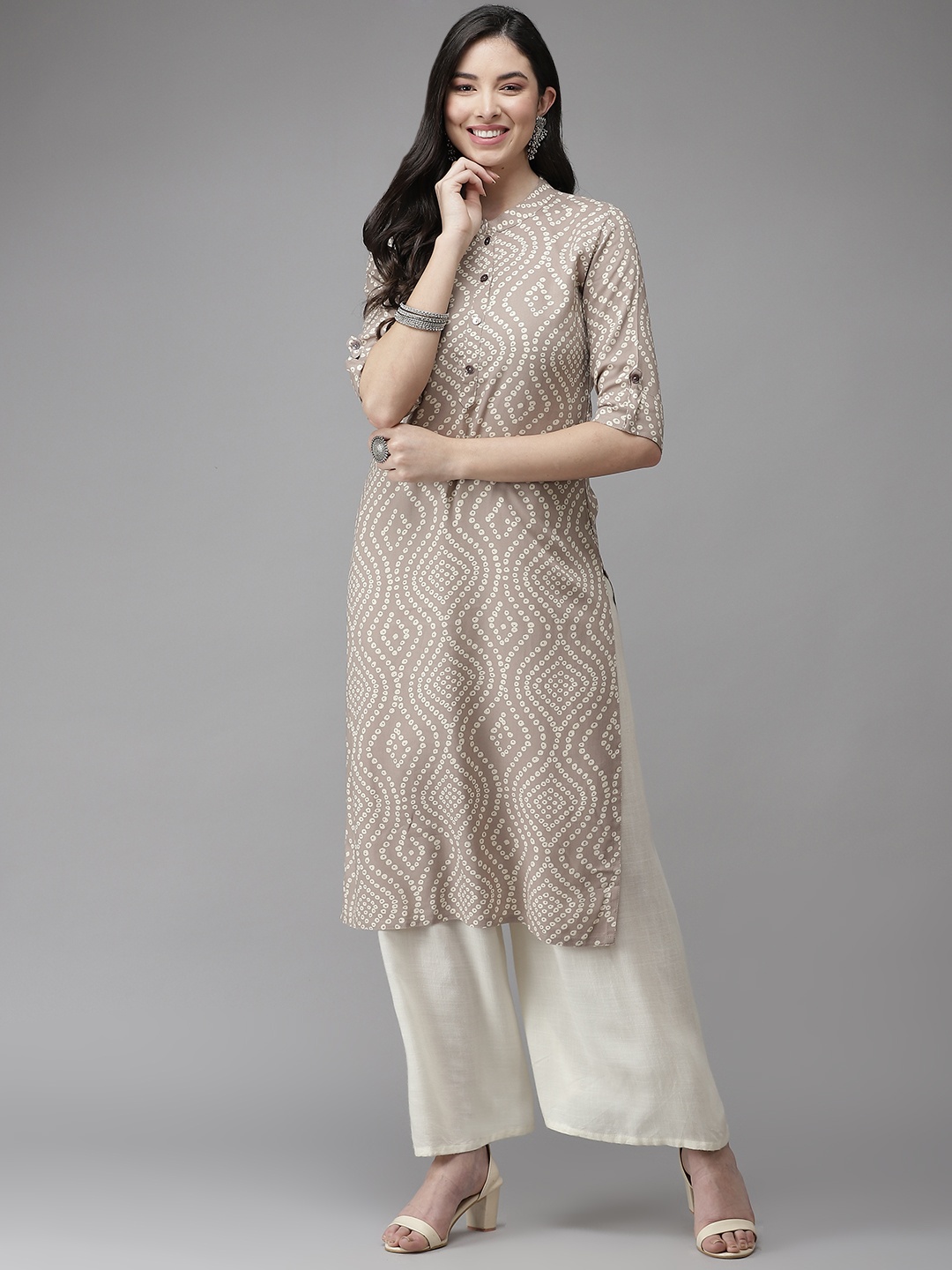 

Cayman Women Beige Bandhani Printed Kurta