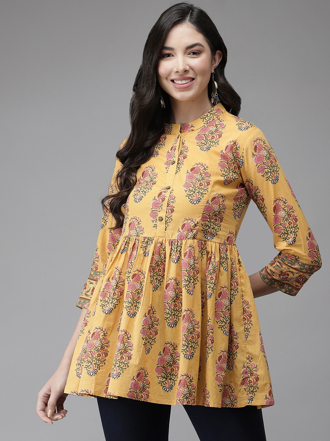 

Cayman Yellow Ethnic Motifs Printed Pure Cotton Empire Kurti