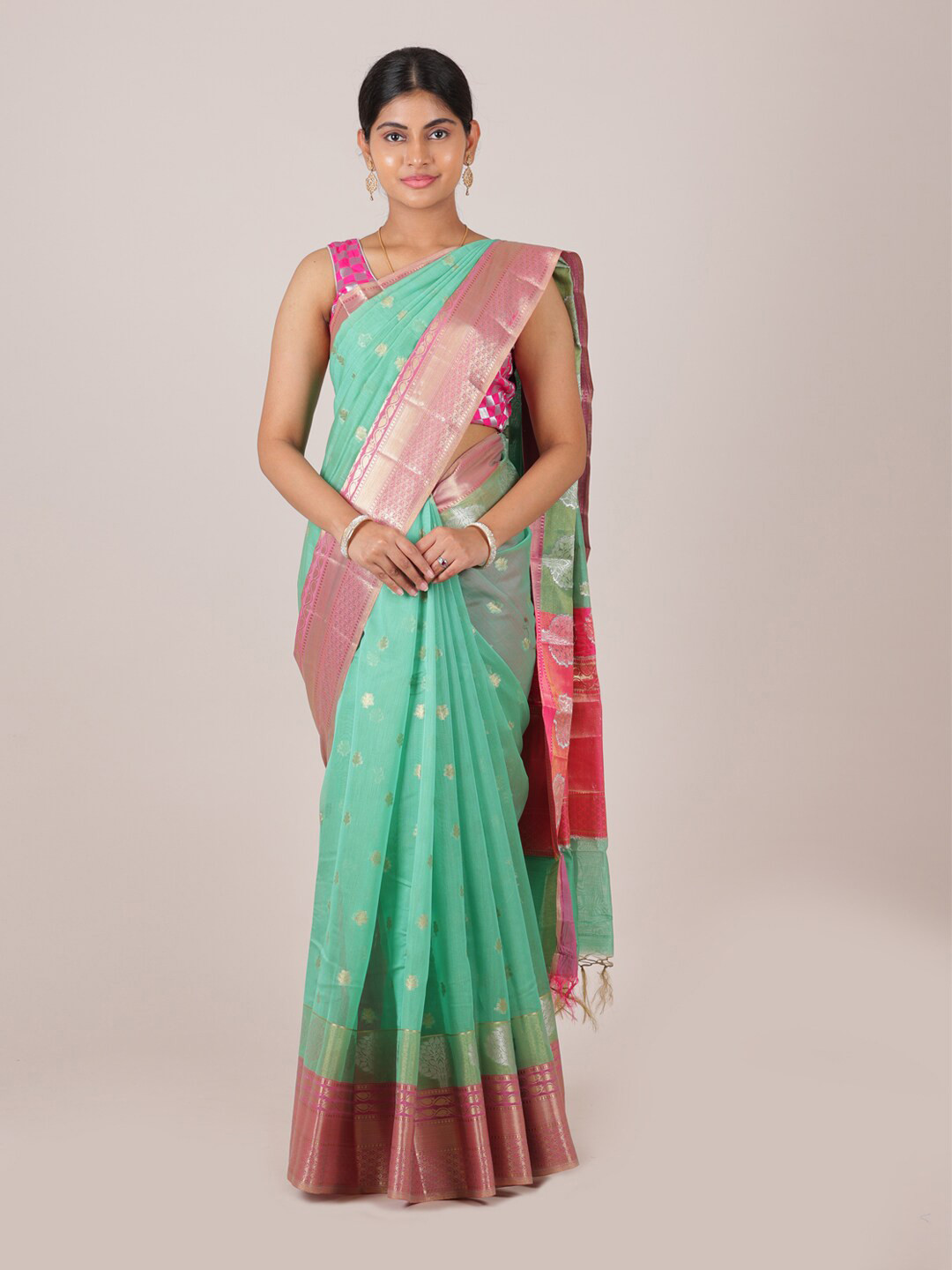 

Pothys Green & Pink Ethnic Motifs Woven Zari Saree