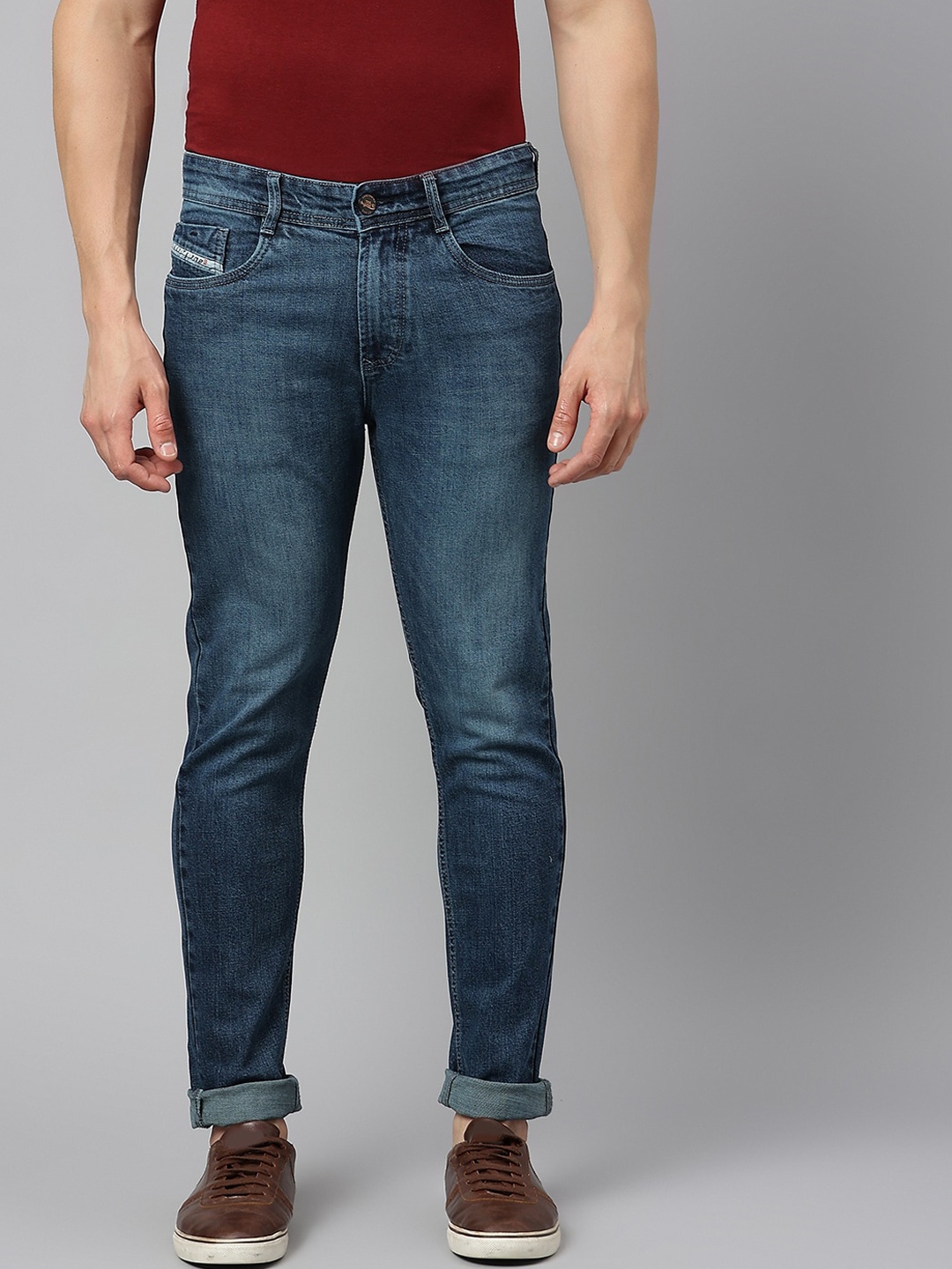 

Code 61 Men Blue Skinny Fit Low-Rise Low Distress Light Fade Stretchable Jeans