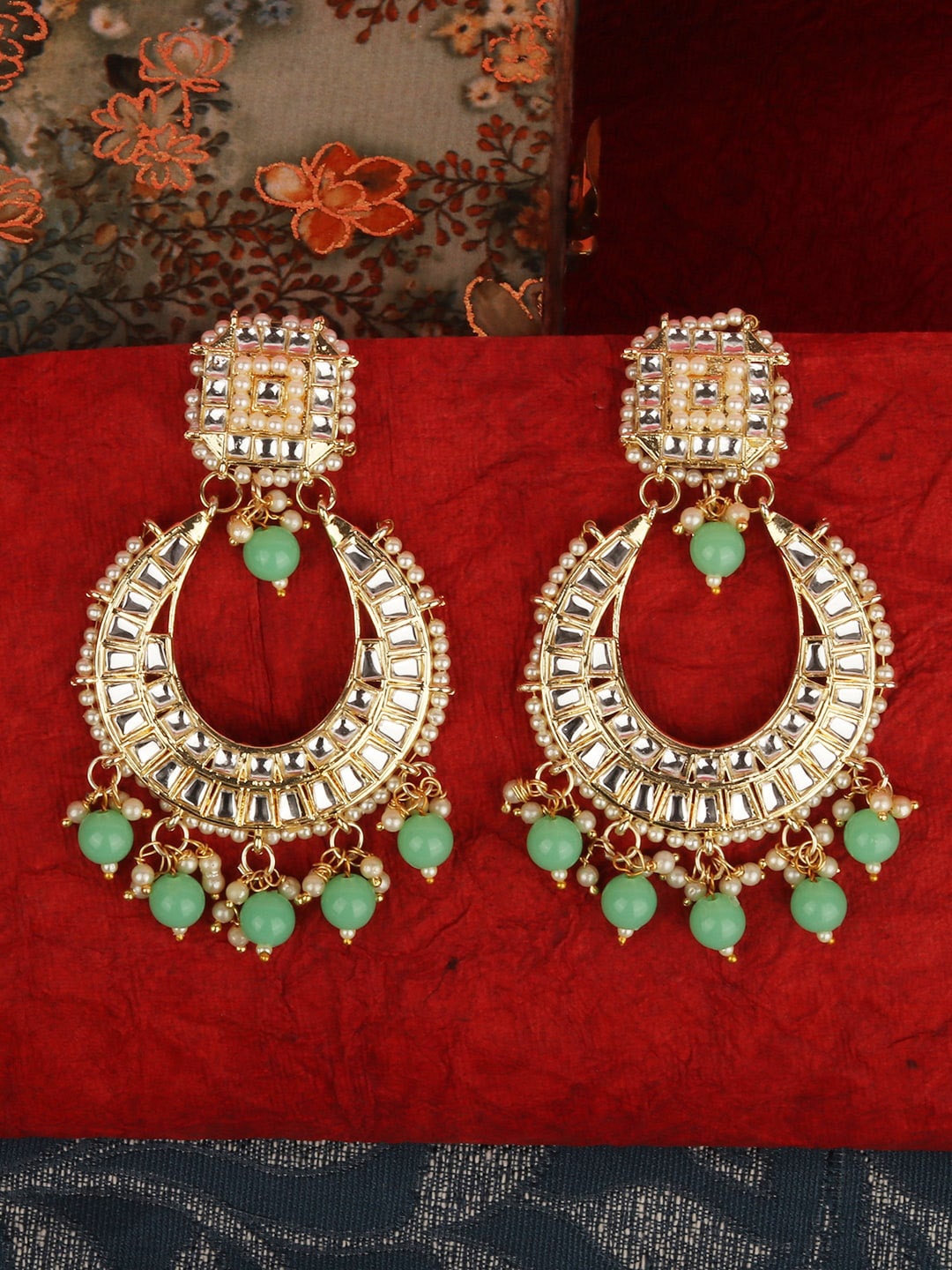 

ANIKAS CREATION Gold-Plated Sea Green & White Crescent Shaped Chandbalis