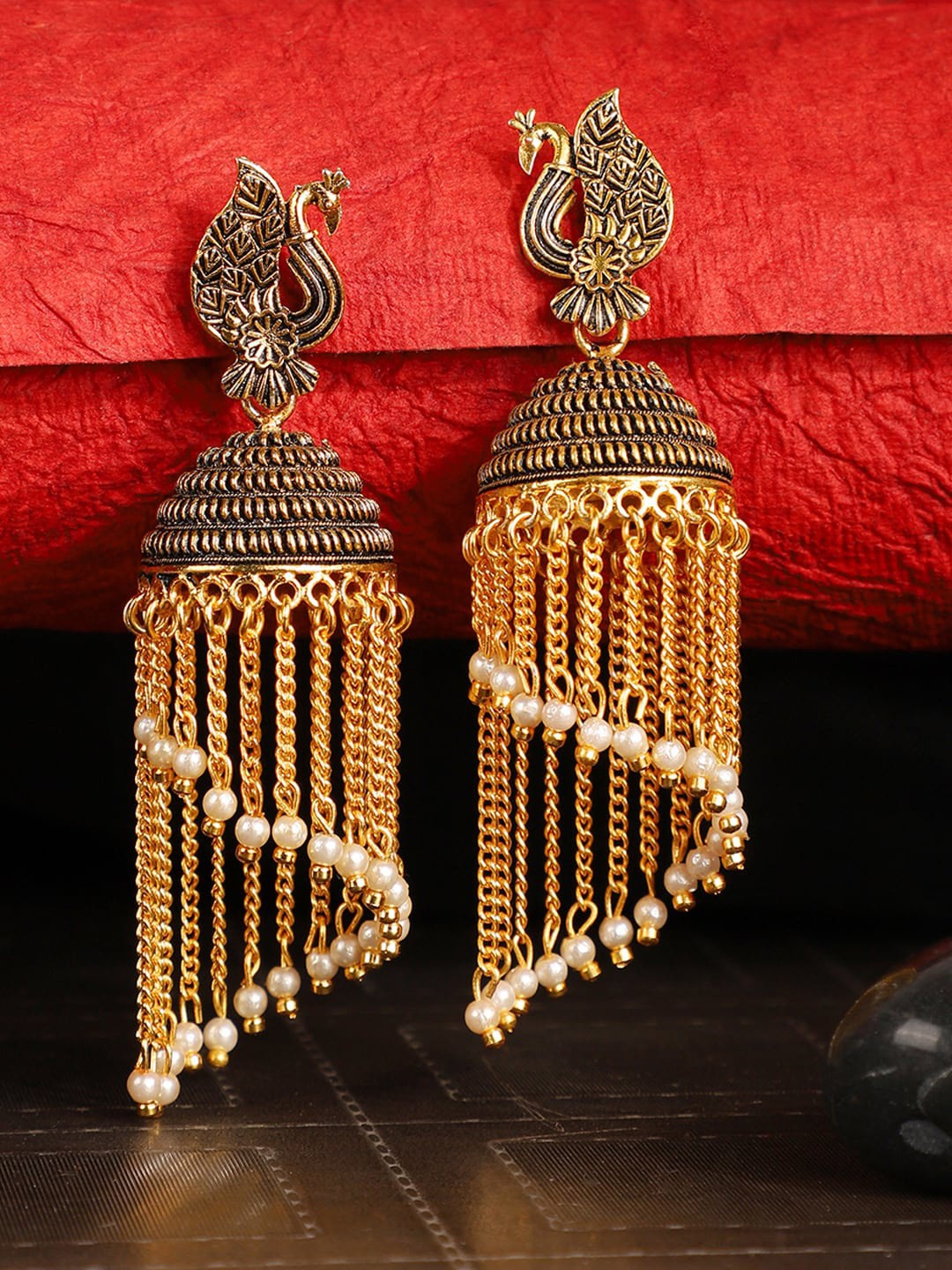 

ANIKAS CREATION Gold-Toned Dome Shaped Jhumkas Earrings