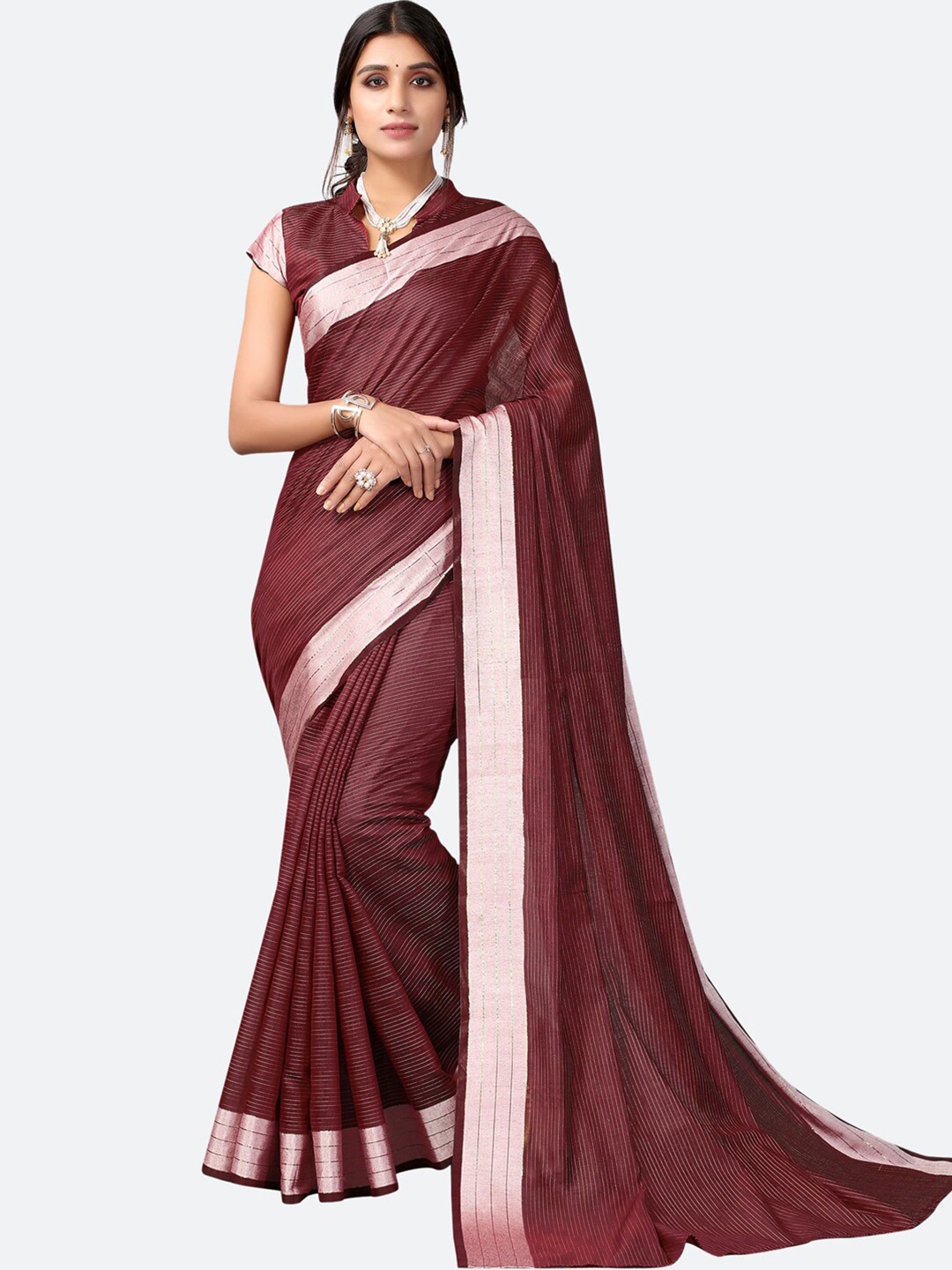 

KALINI Maroon Solid Polycotton Saree