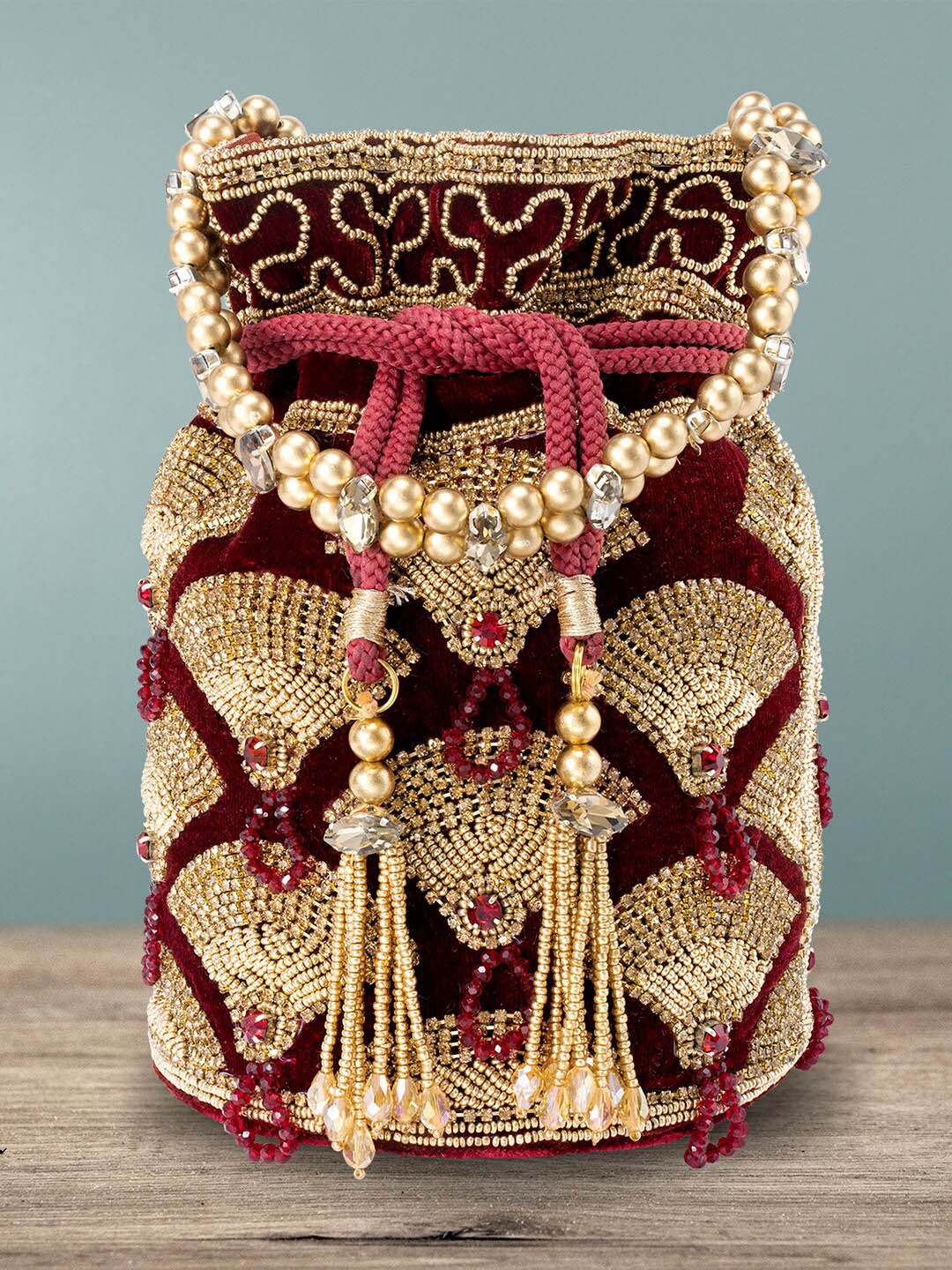 

Peora Women Maroon Embellished Potli Clutch