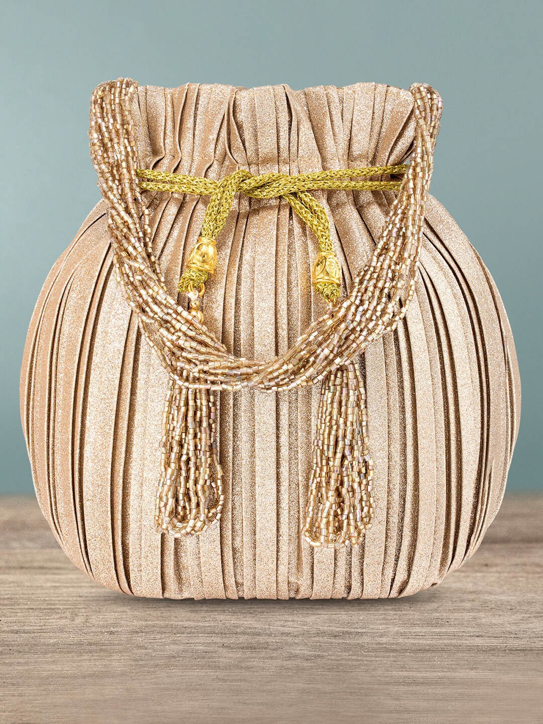 

Peora Rose Gold Embellished Potli Clutch