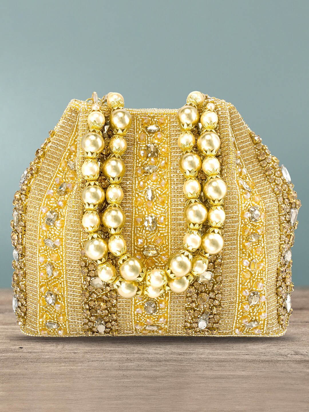 

Peora Gold-Toned Embellished Potli Clutch