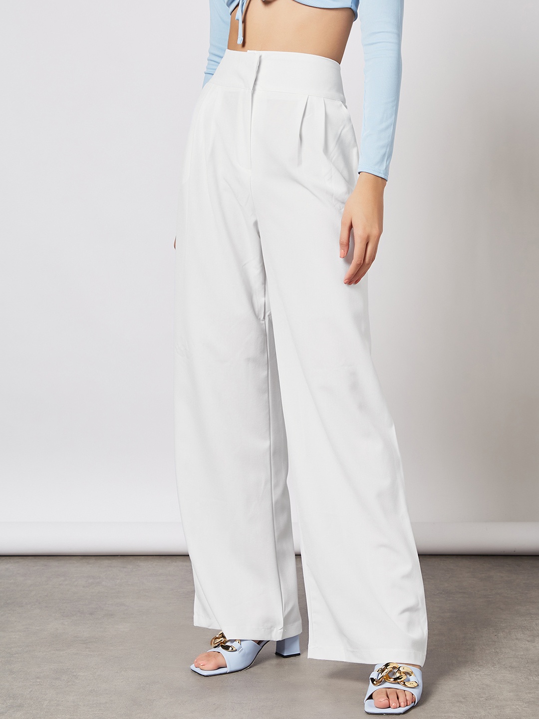

Femme Luxe Women White Solid Pleated Trousers