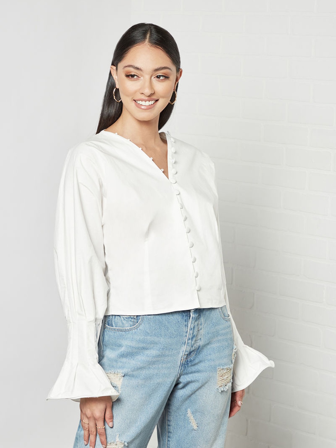 

Femme Luxe White Solid Top With Wired Bell Sleeves