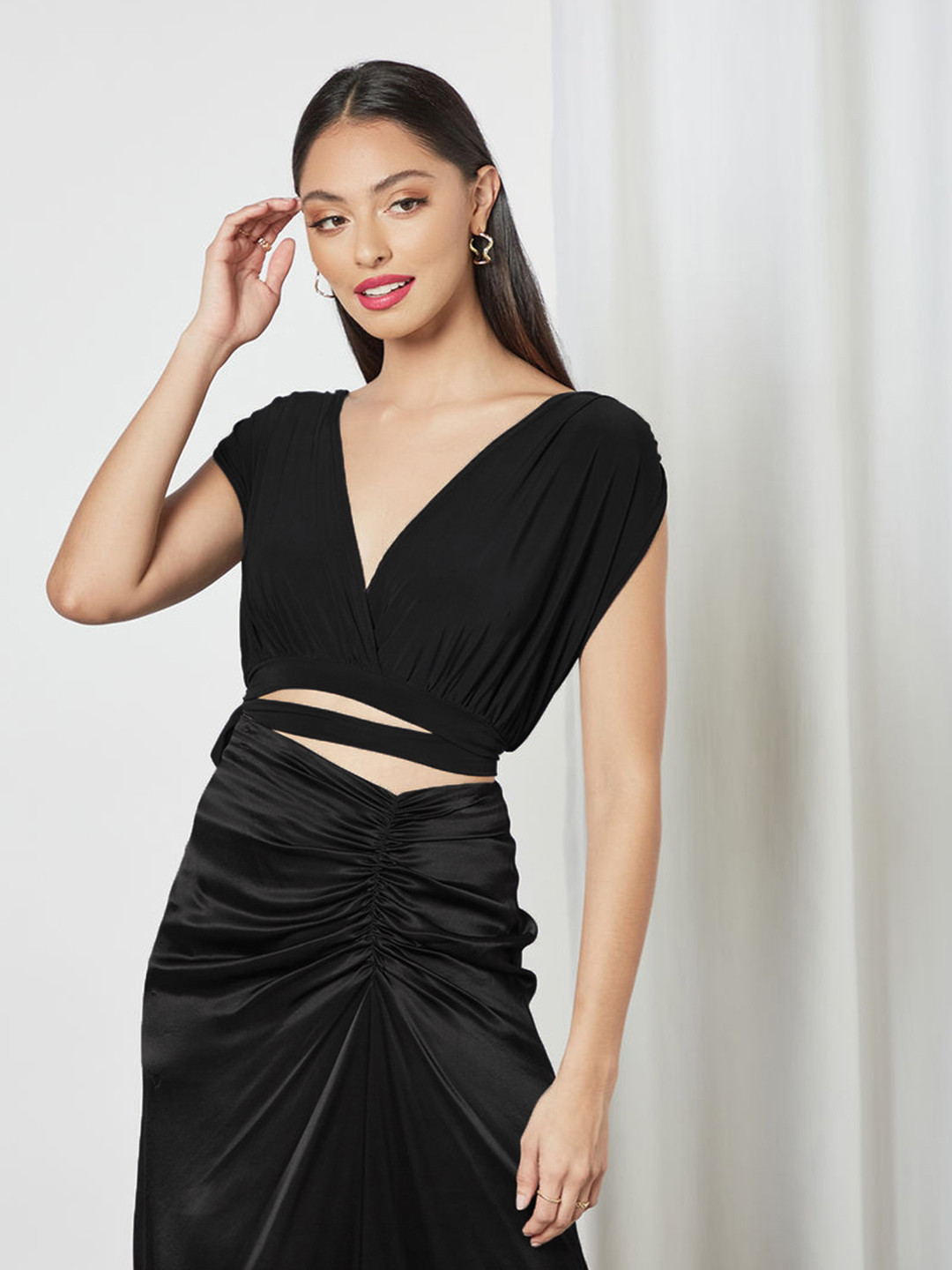 

Femme Luxe Black Solid Extended Sleeves Wrap Crop Top