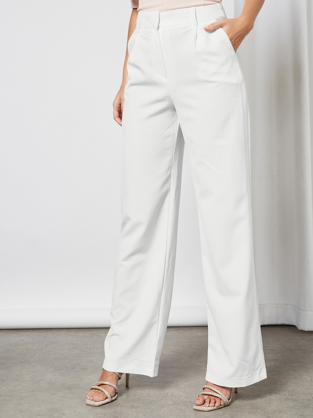 

Femme Luxe Women White Solid Pleated Trousers