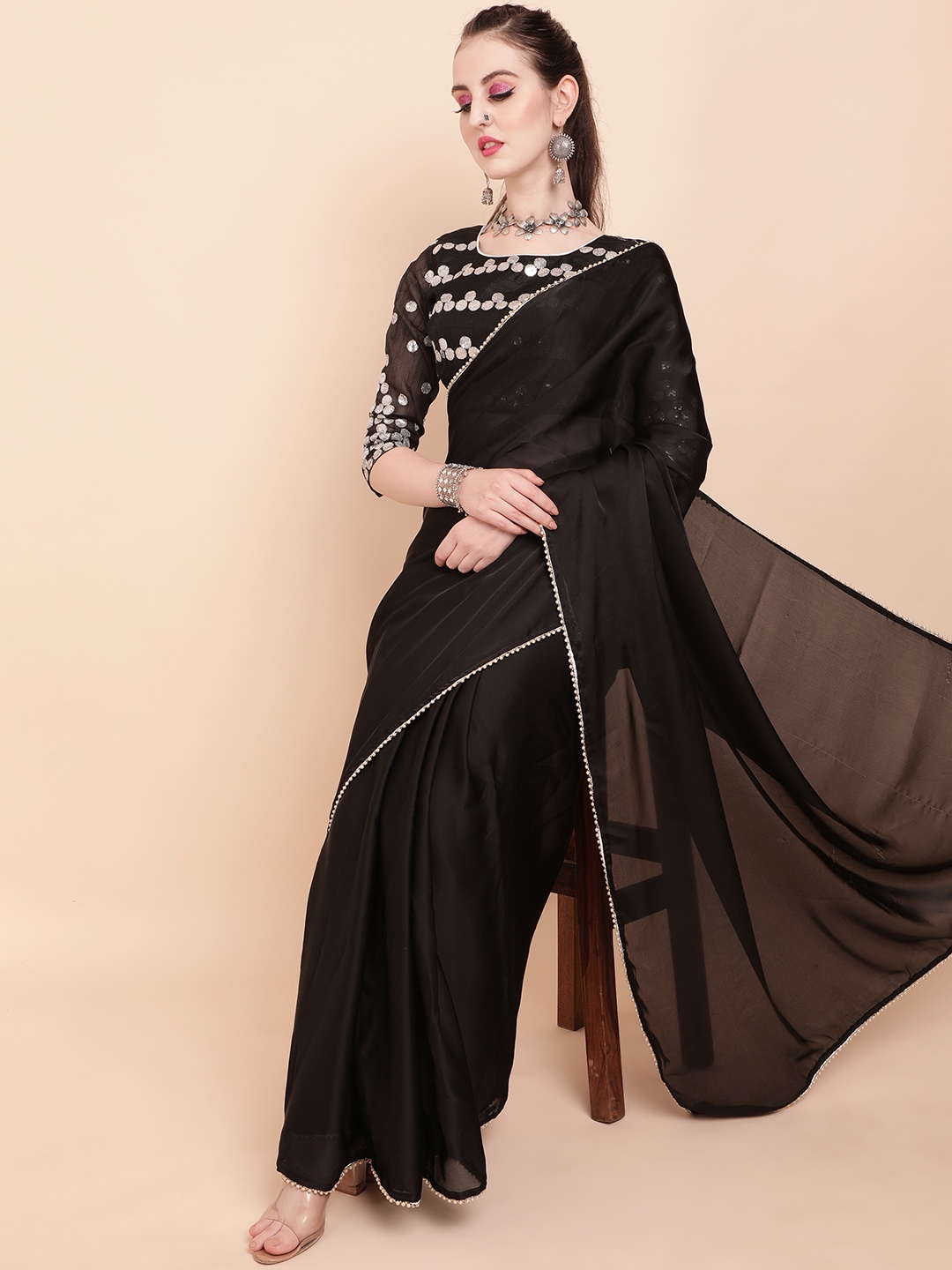 

Sangria Women Black Plain Satin Pearl Border Saree