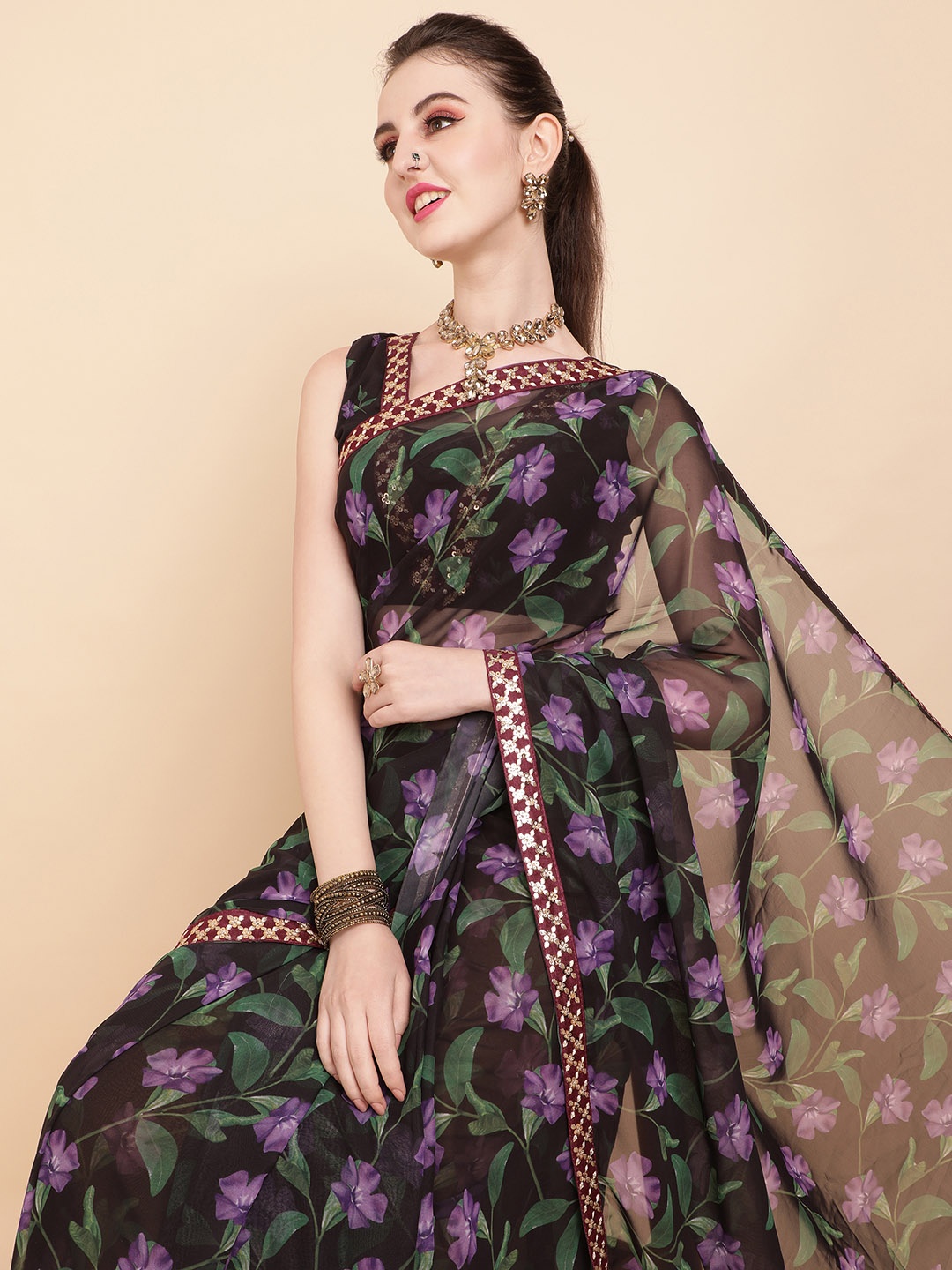 

Sangria Black & Purple Floral Printed Sequinned Pure Georgette Saree