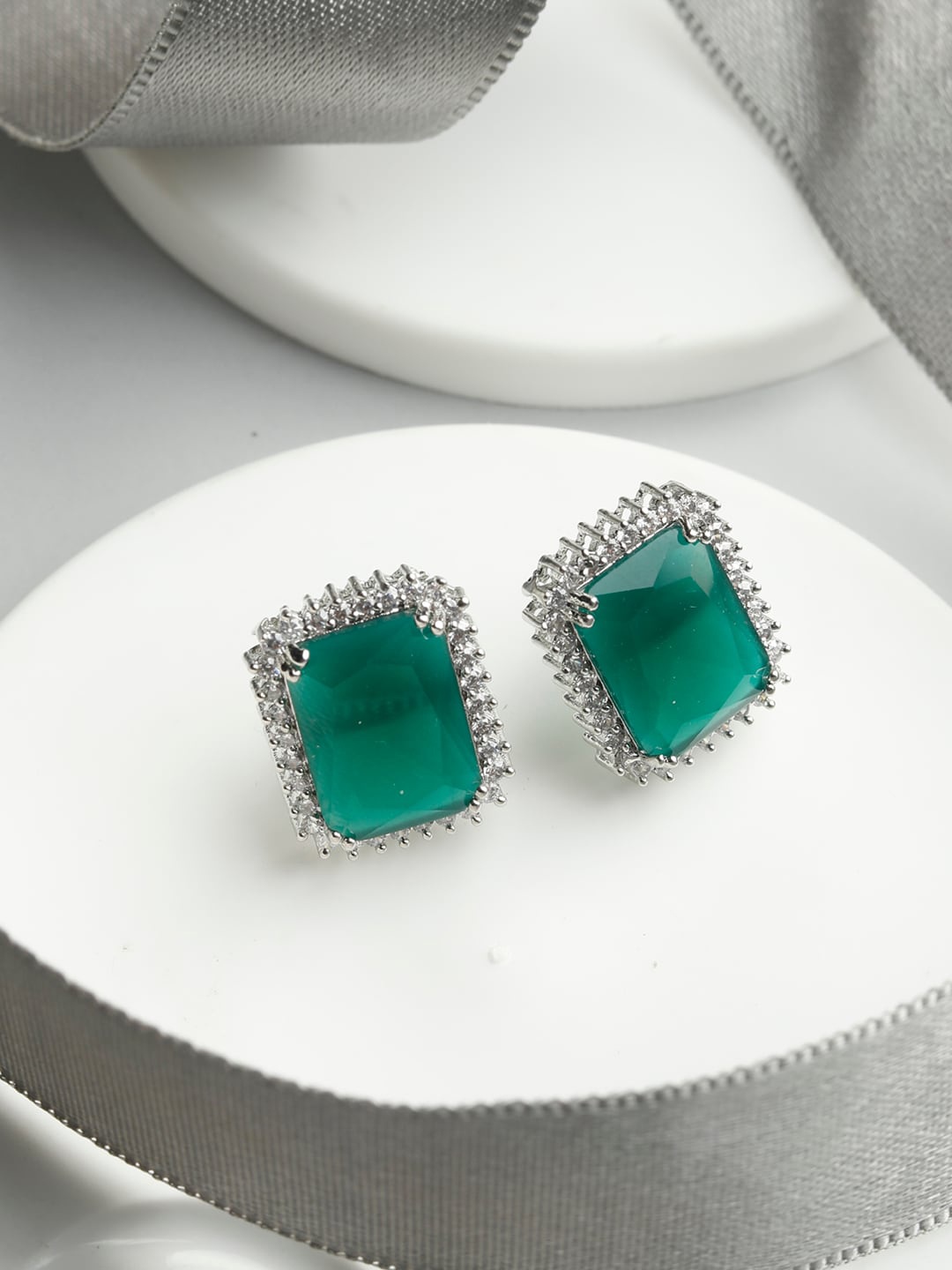 

Priyaasi Silver-Plated Green & White American Diamond Studs Earrings