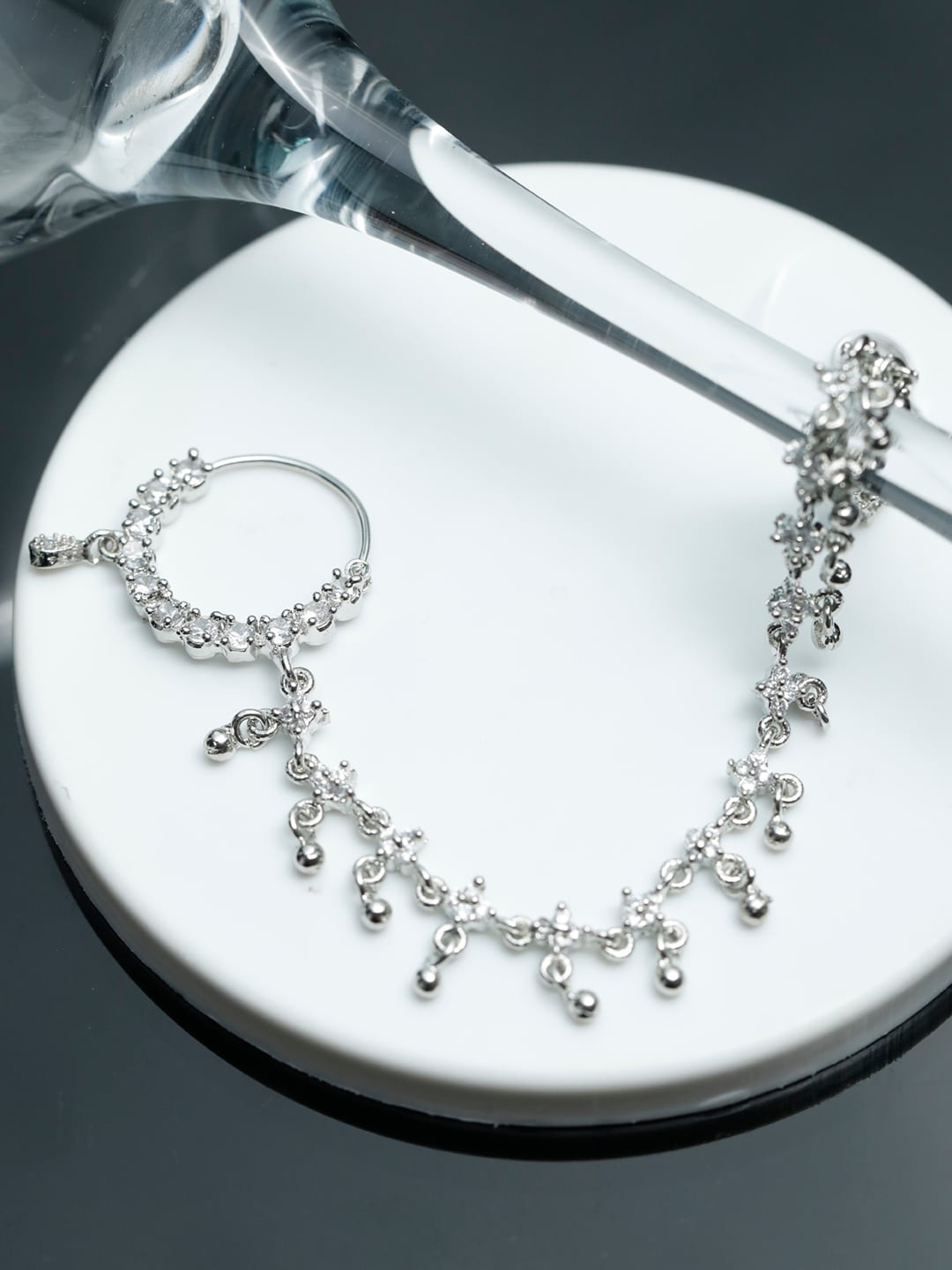 

Priyaasi Women Silver Plated American Diamond Chained Nosepin