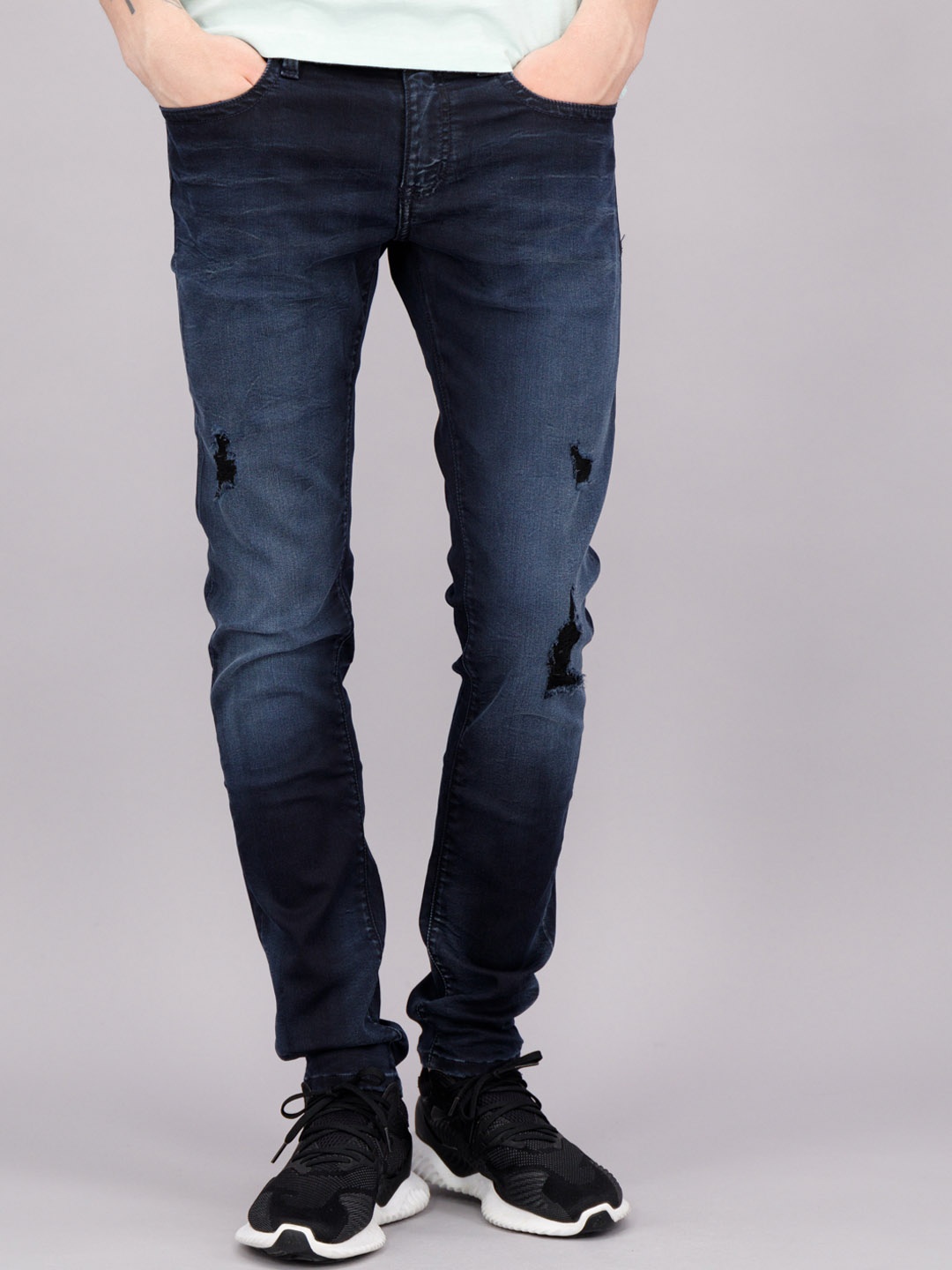

FREESOUL Men Blue Skinny Fit Mildly Distressed Light Fade Jeans