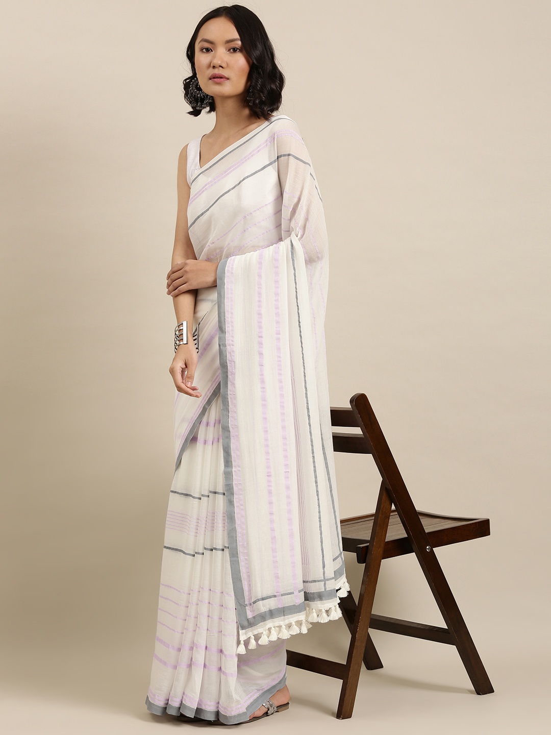 

Suta White & Lavender Striped Saree