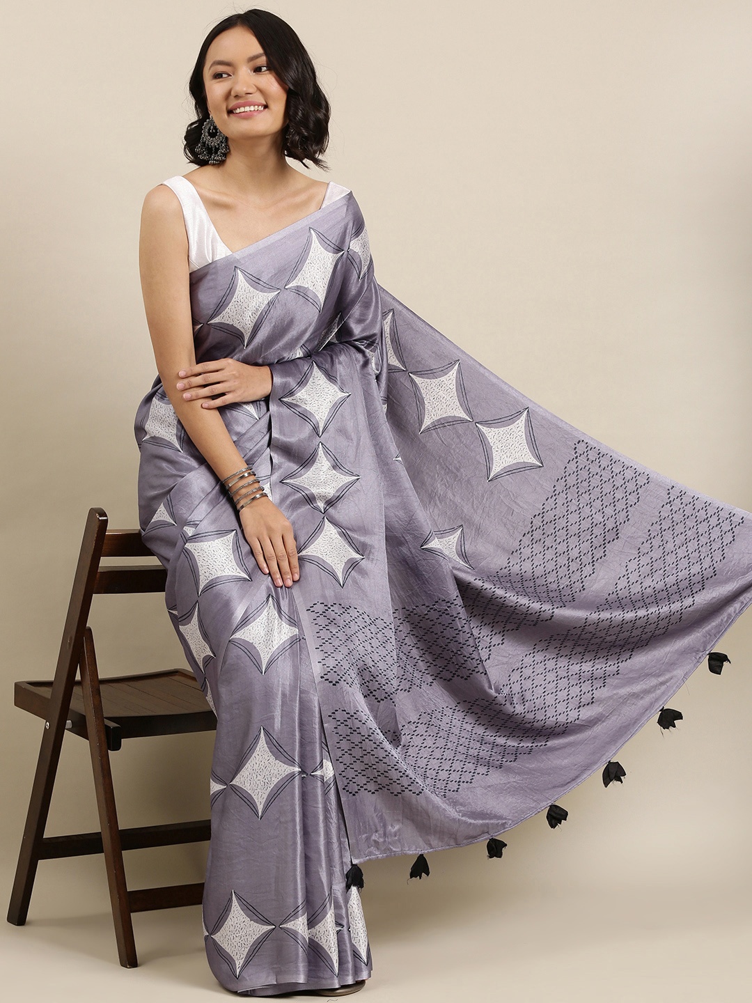 

Suta Charcoal Grey & White Printed Saree