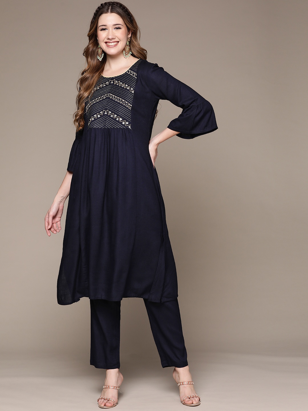 

Anubhutee Women Navy Blue Geometric Embroidered Pleated Kurta with Trousers