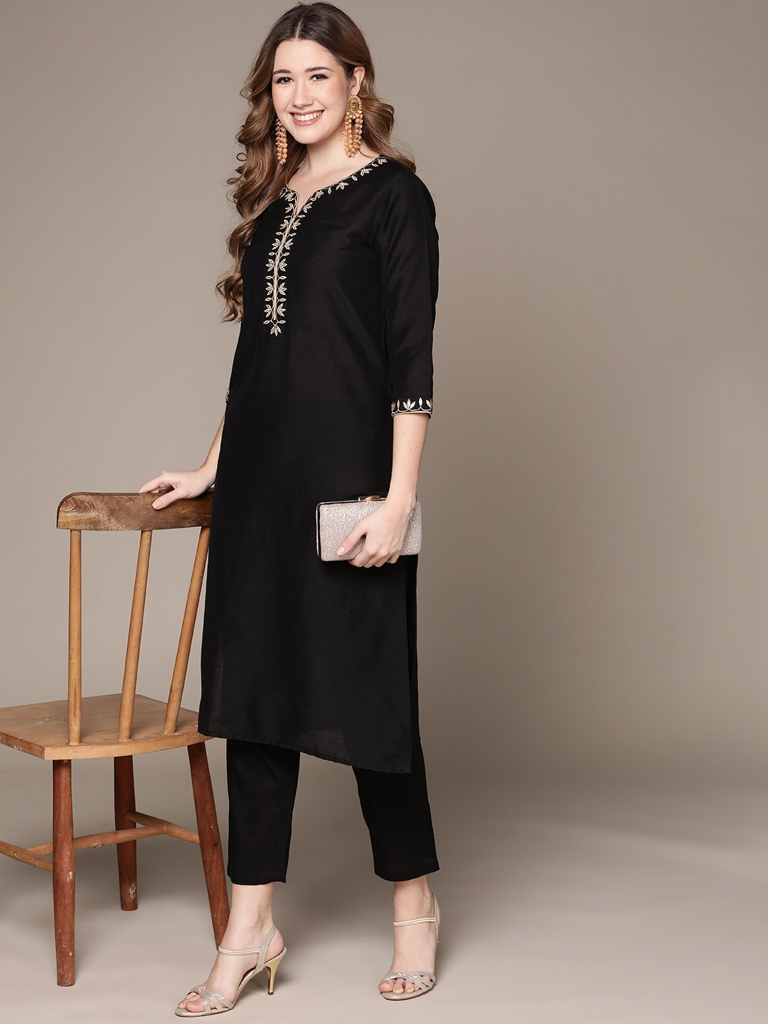 

Ishin Women Black Ethnic Motifs Embroidered Kurta with Trousers