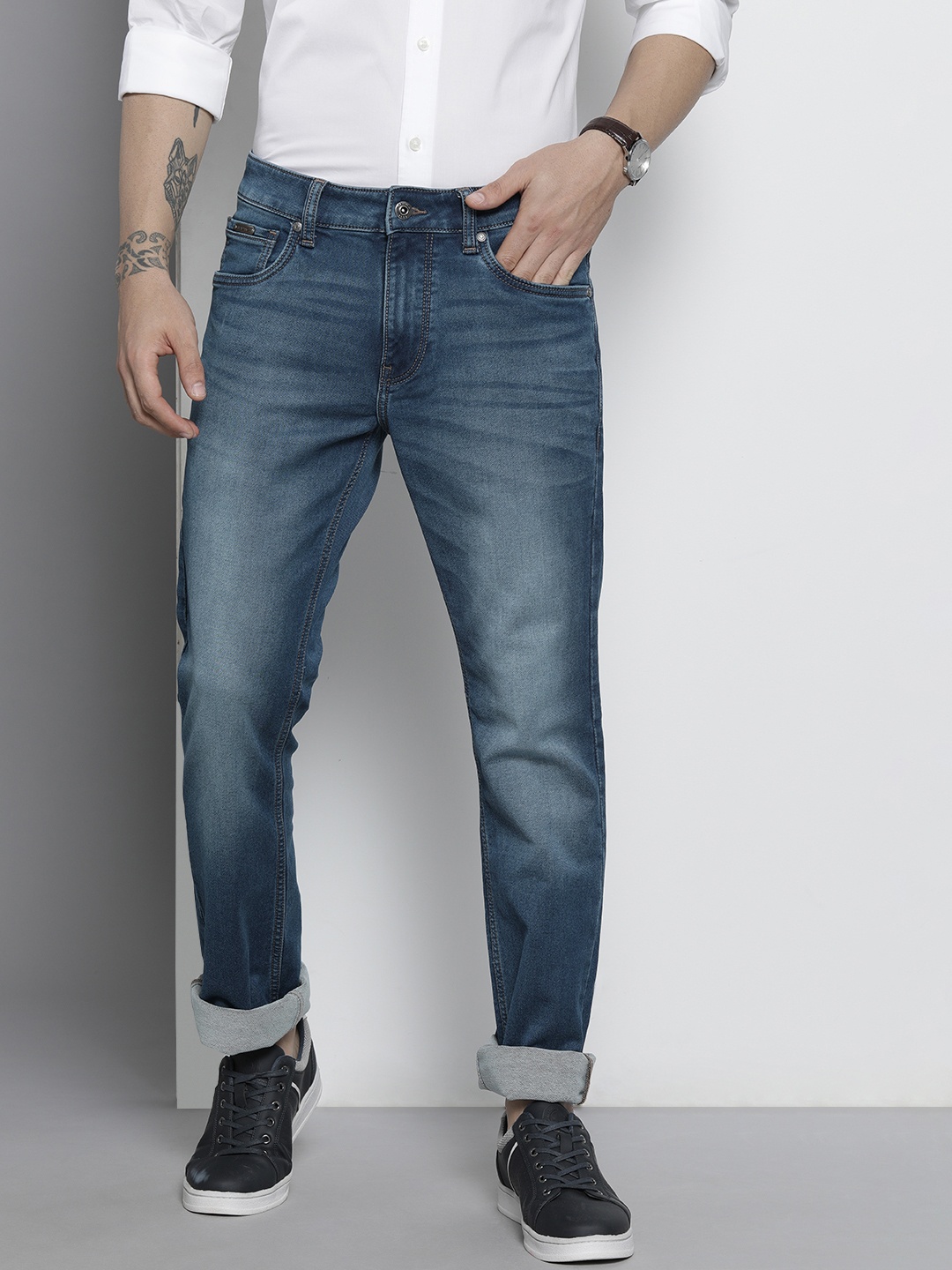 

Nautica Men Blue Straight Fit Light Fade Mid Rise Stretchable Jeans