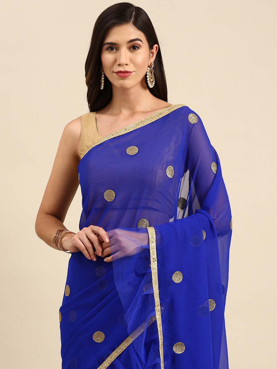 

Anouk Blue & Golden Pure Georgette Embroidered Ruffled Trim Saree