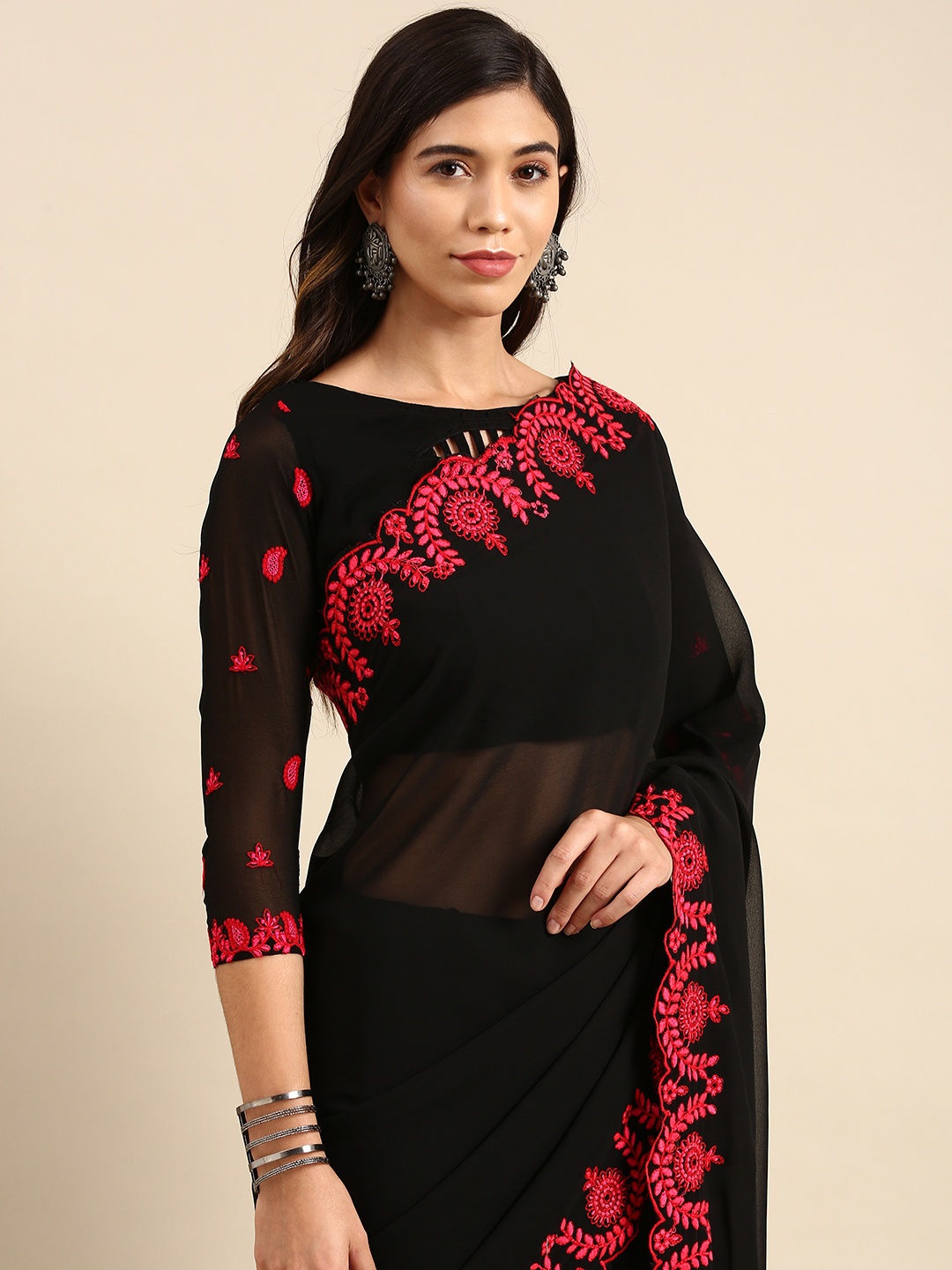 

Anouk Black Solid With Embroidered Border Pure Georgette Saree