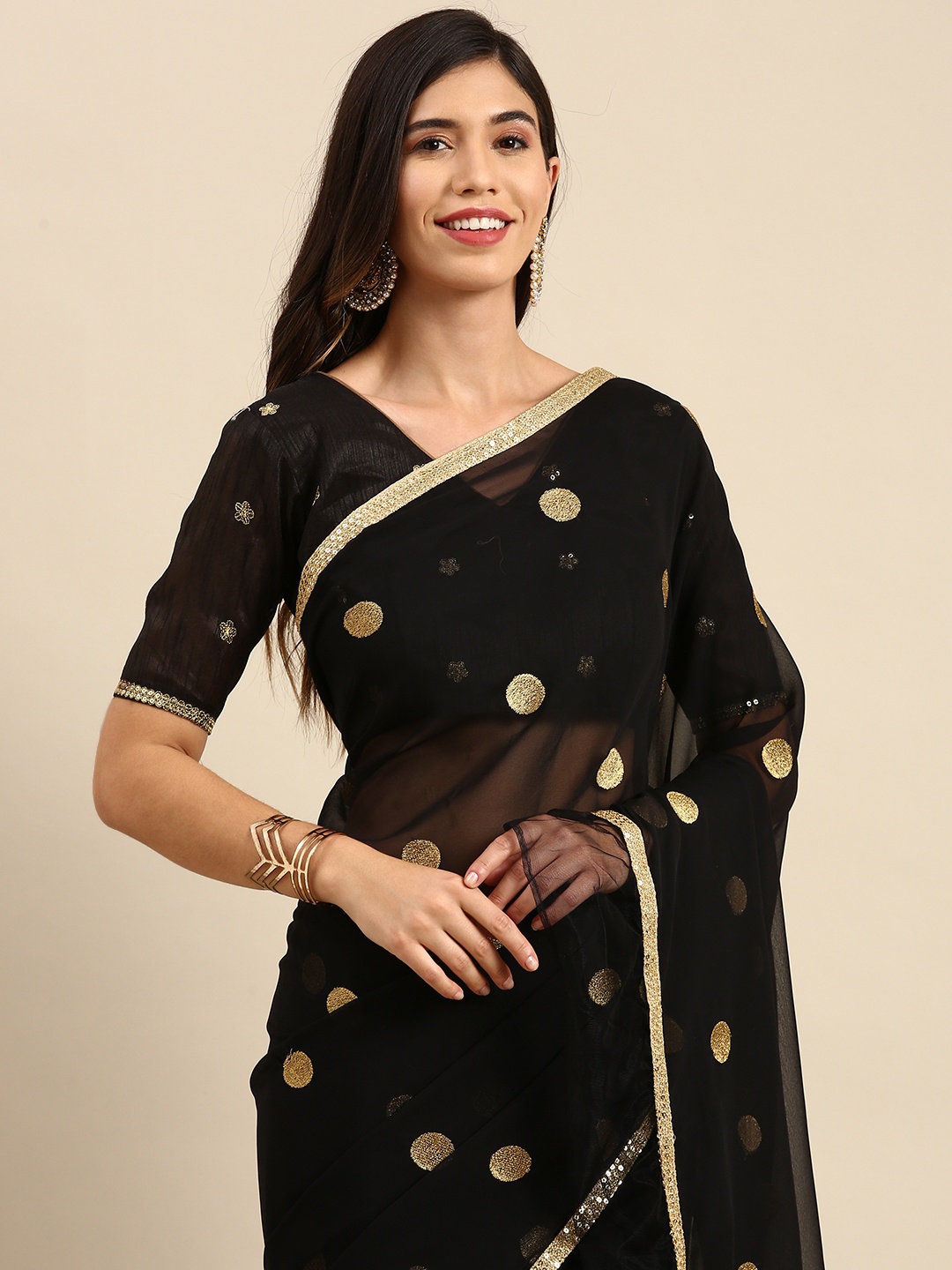 

Anouk Black & Golden Embroidered Sequinned Pure Georgette Saree