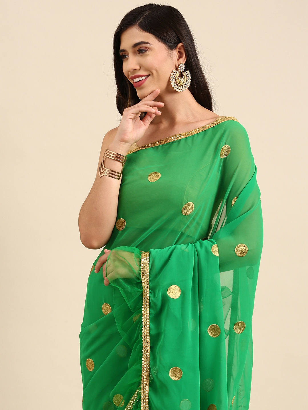 

Anouk Green & Golden Embroidered Sequinned Pure Georgette Saree