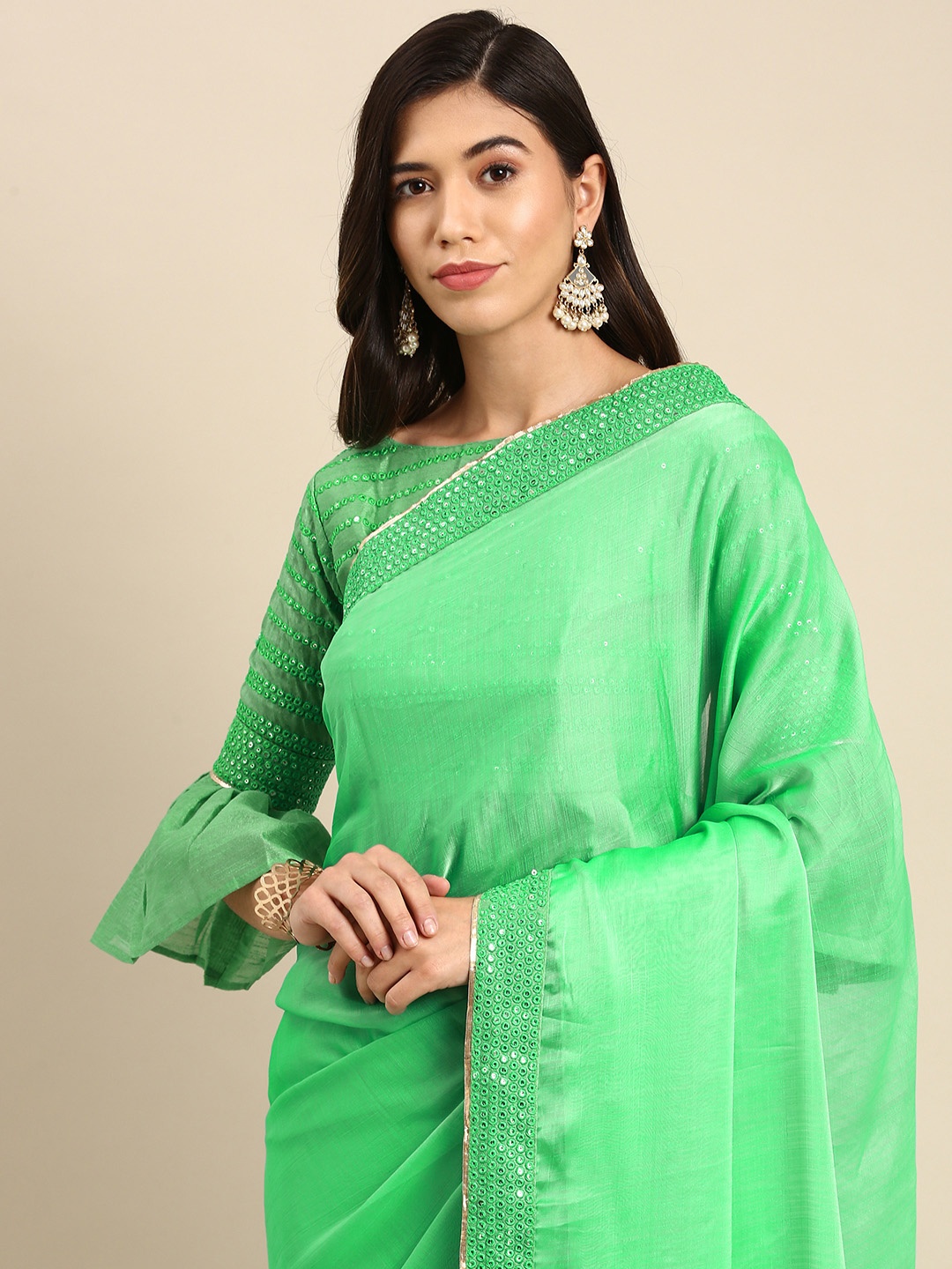 

Anouk Green Solid Sequinned Pure Chiffon Saree
