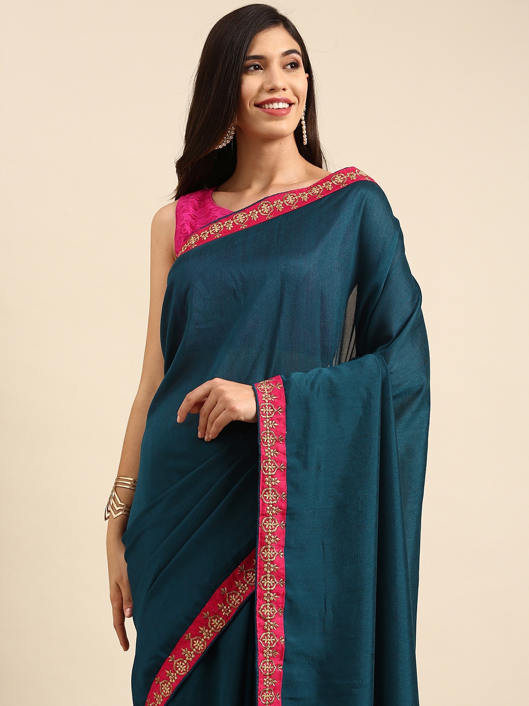 

Anouk Teal Blue Solid Embroidered Silk Blend Saree