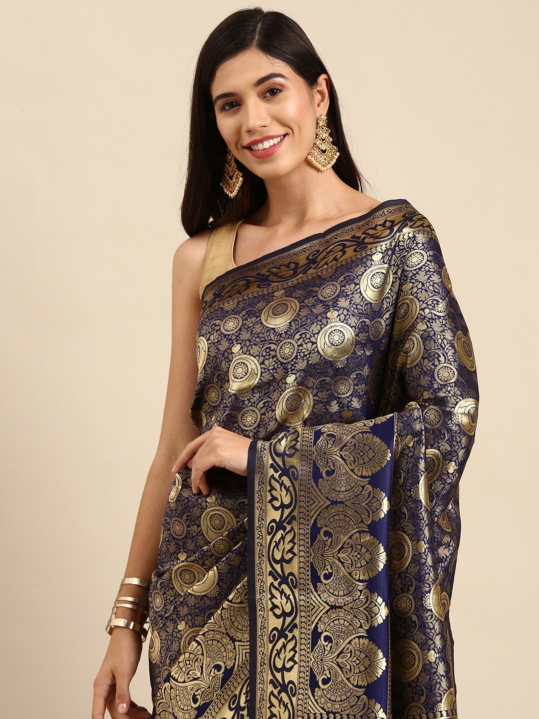 

Anouk Navy Blue & Golden Ethnic Motifs Zari Woven Design Banarasi Saree