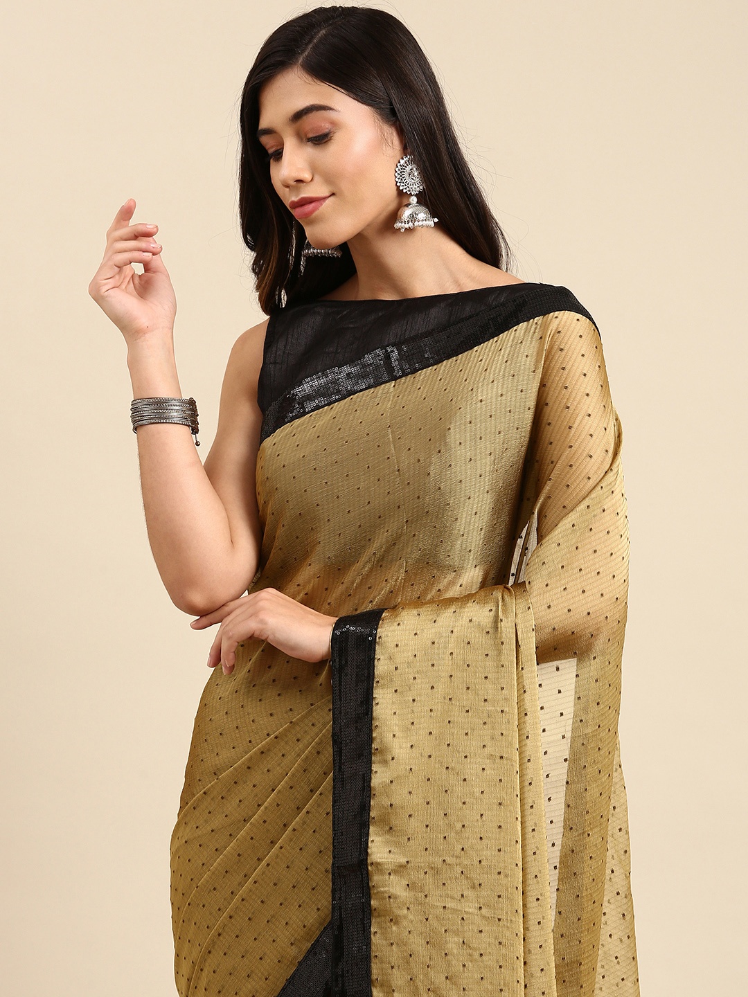 

Anouk Beige Dobby Weaved Saree with Sequinned Border