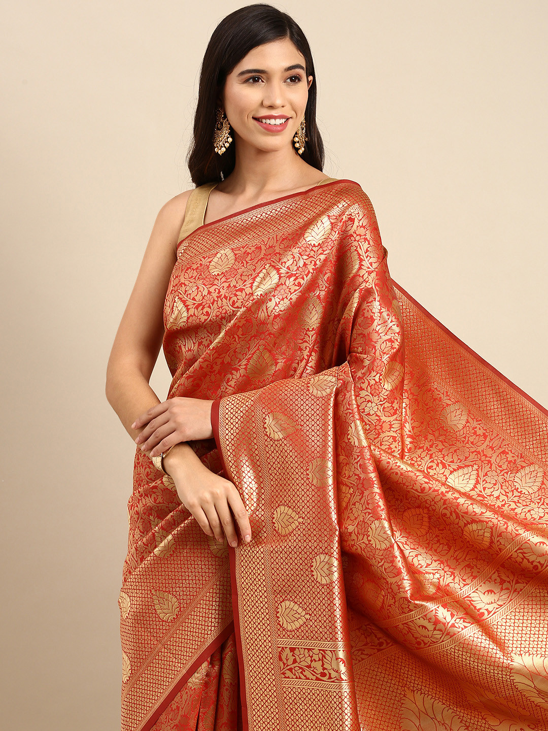 

Anouk Red & Golden Ethnic Motifs Zari Woven Design Banarasi Saree