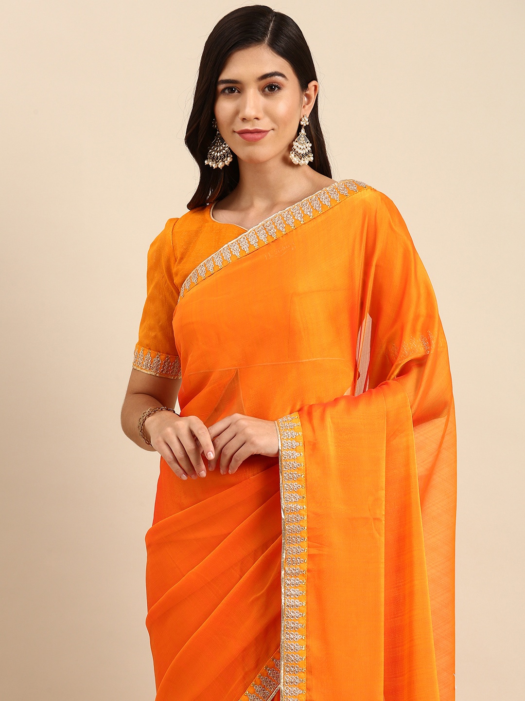 

Anouk Orange Solid Sequinned Pure Chiffon Saree