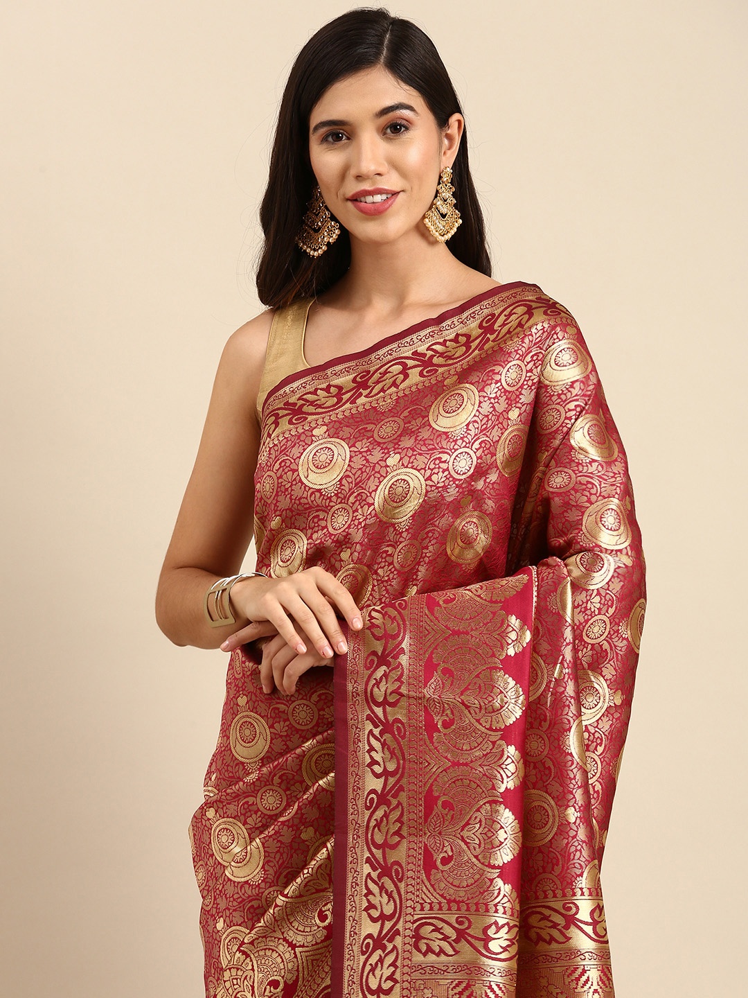 

Anouk Maroon & Golden Ethnic Motifs Zari Woven Design Banarasi Saree