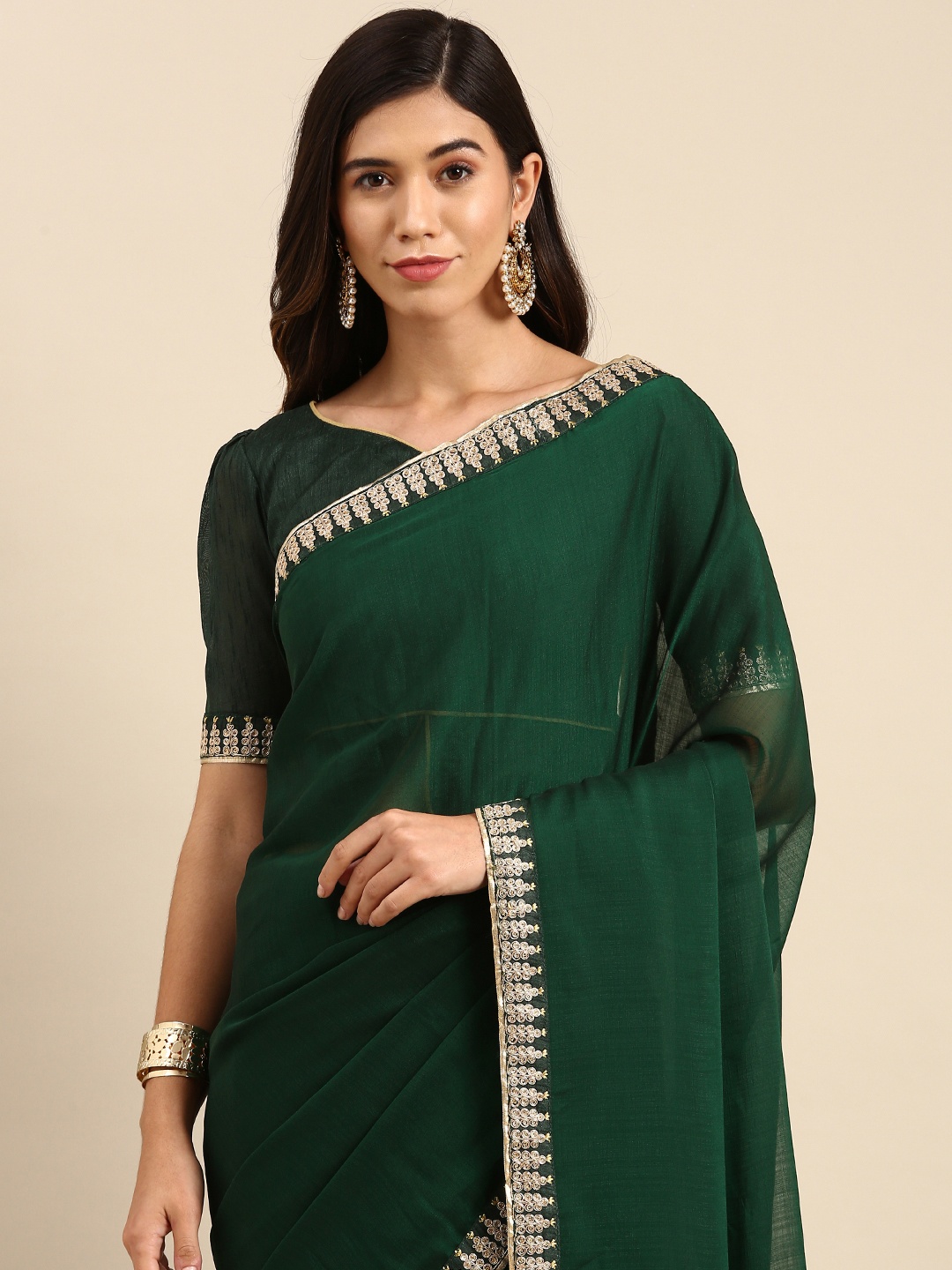 

Anouk Green Solid Saree with Embellished Border