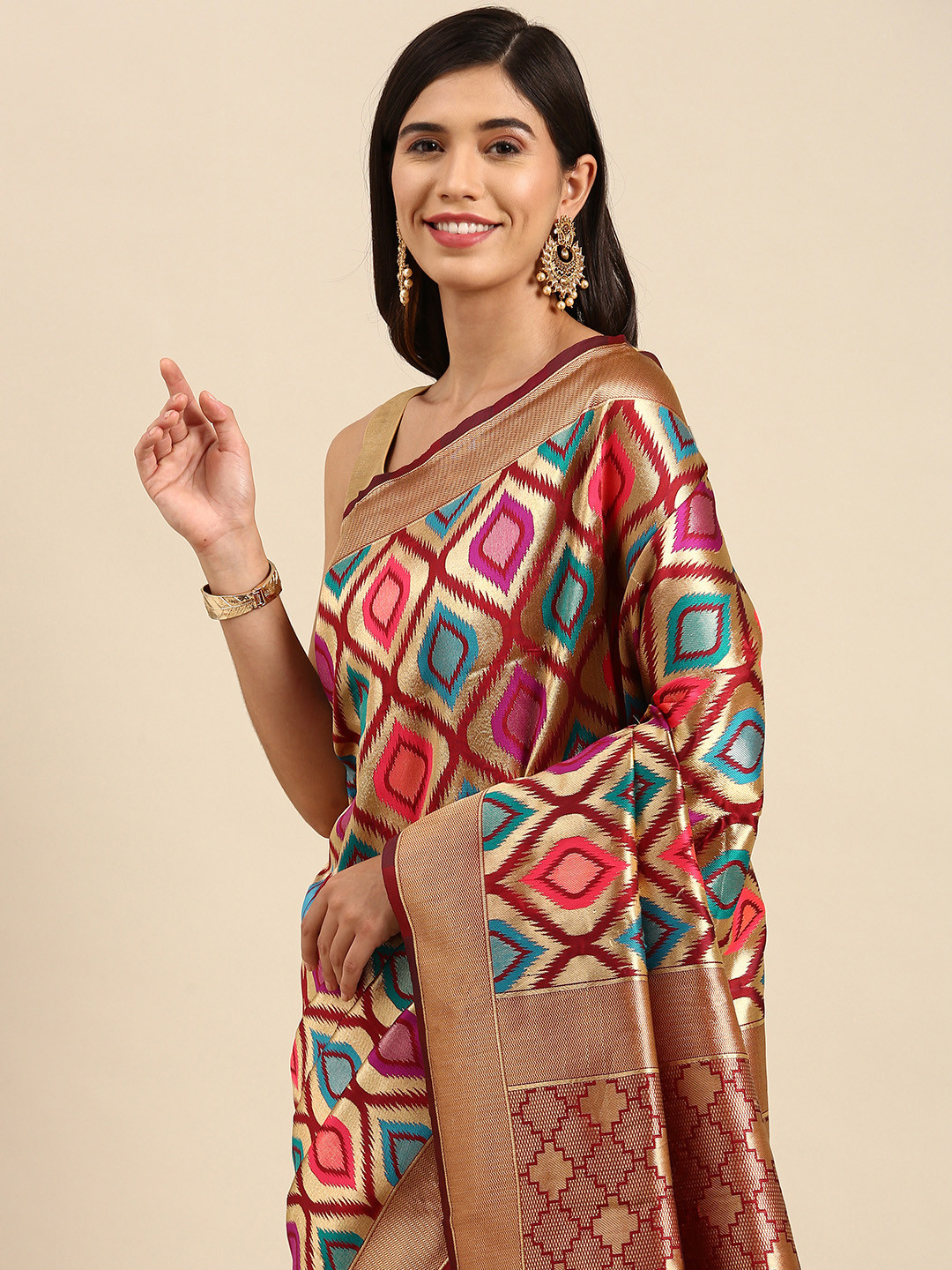 

Anouk Maroon & Golden Zari Woven Design Banarasi Saree