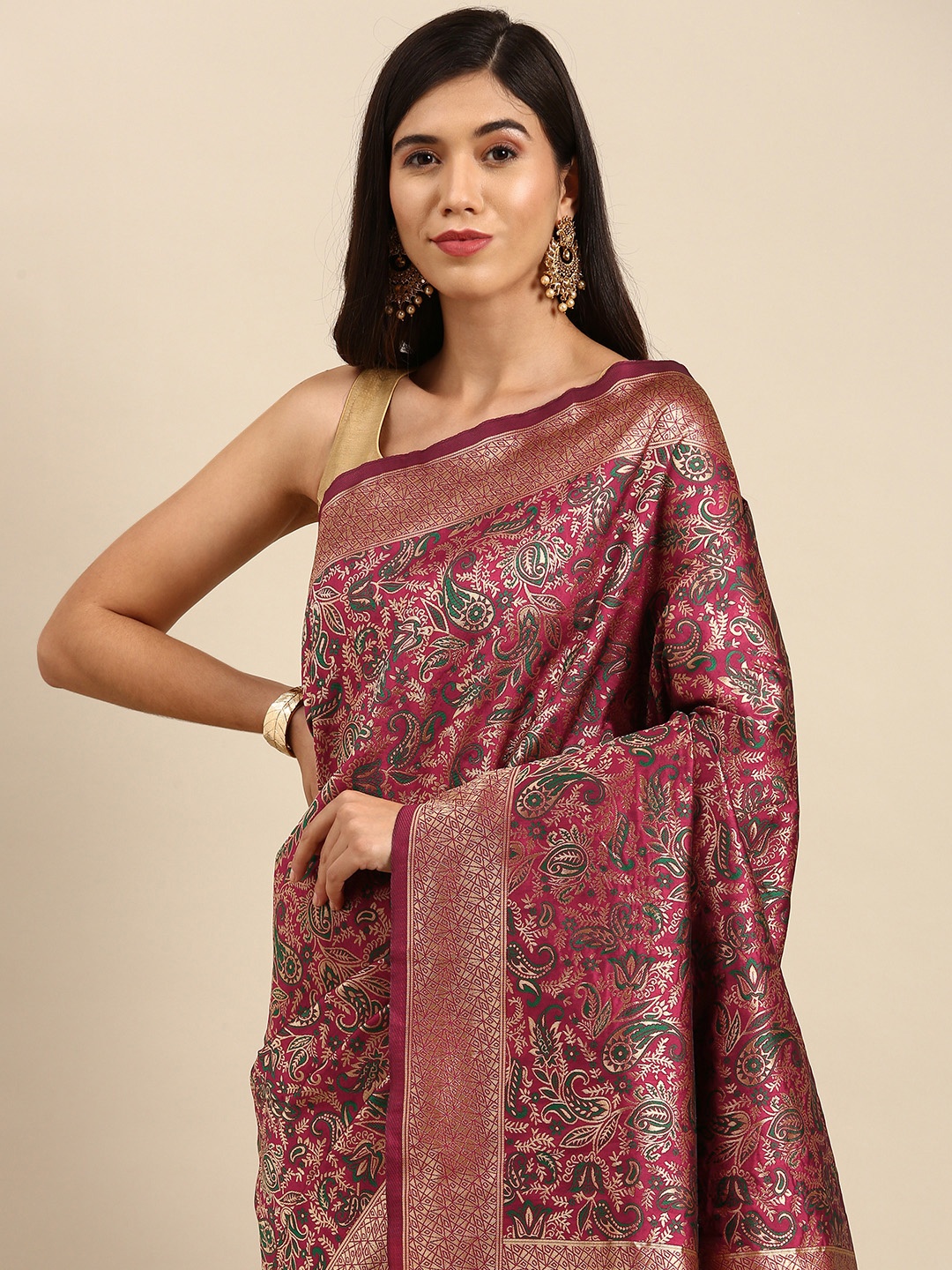 

Anouk Magenta & Golden Ethnic Motifs Zari Woven Design Banarasi Saree