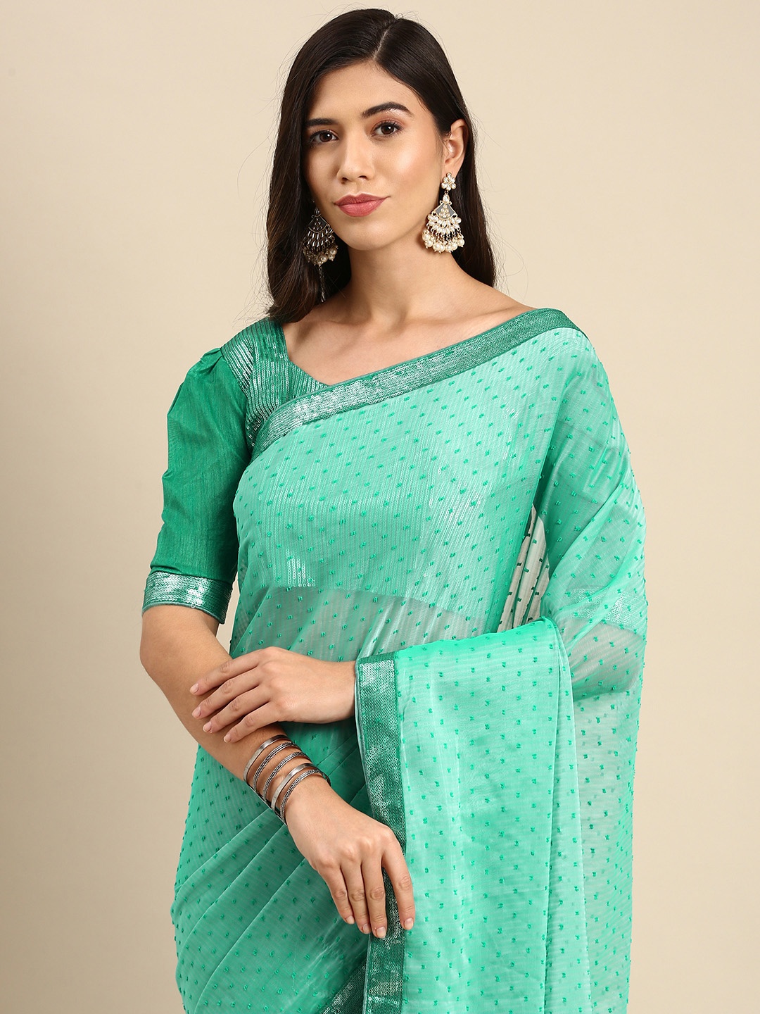 

Anouk Turquoise Blue Solid Sequinned Silk Blend Saree