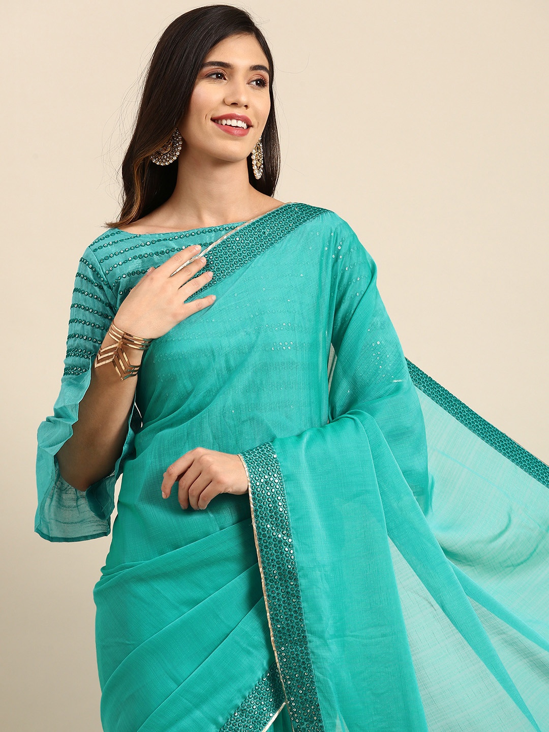 

Anouk Teal Blue Sold Sequinned Pure Chiffon Saree