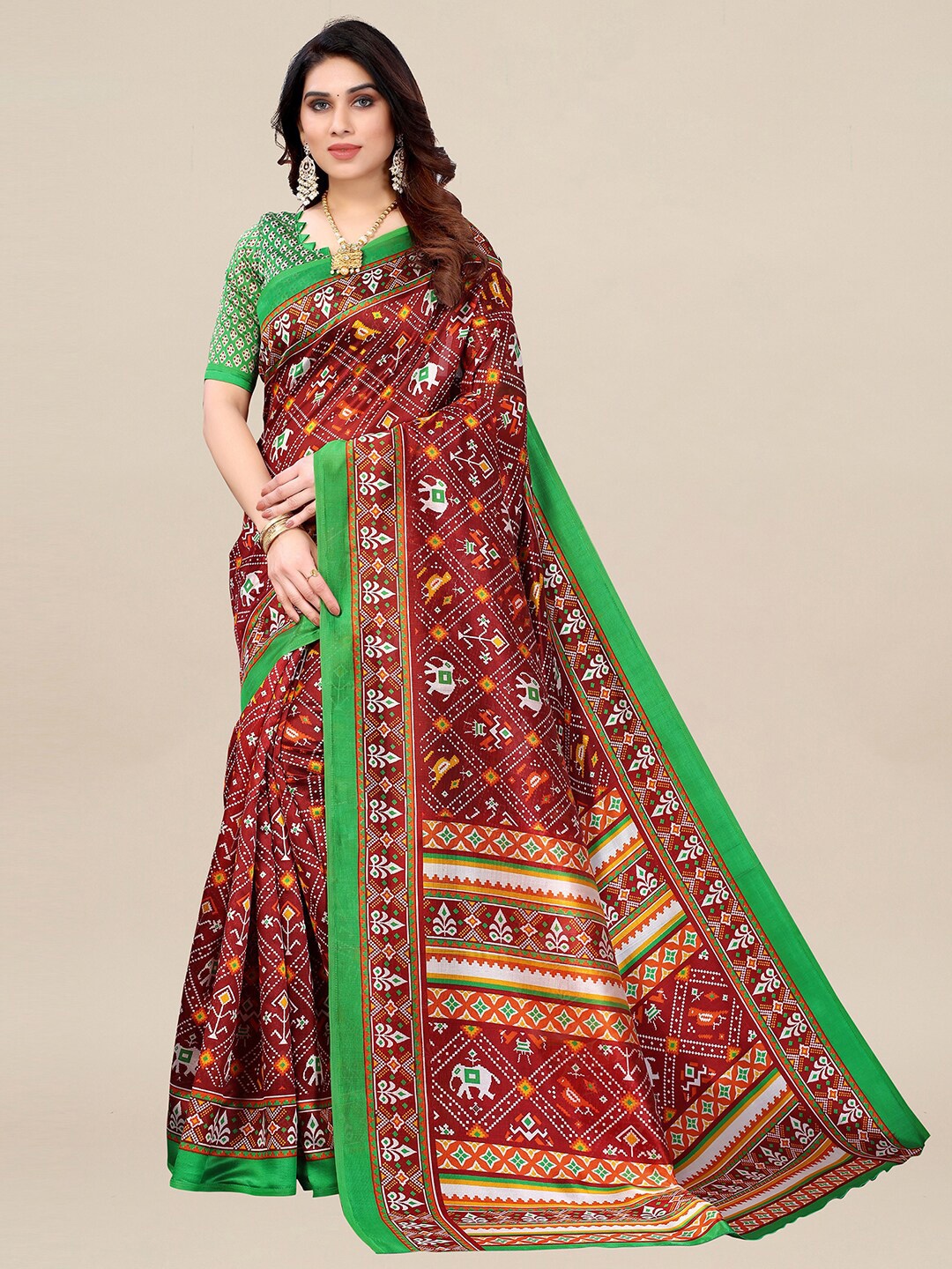 

KALINI Maroon & Green Ethnic Motifs Art Silk Patola Saree