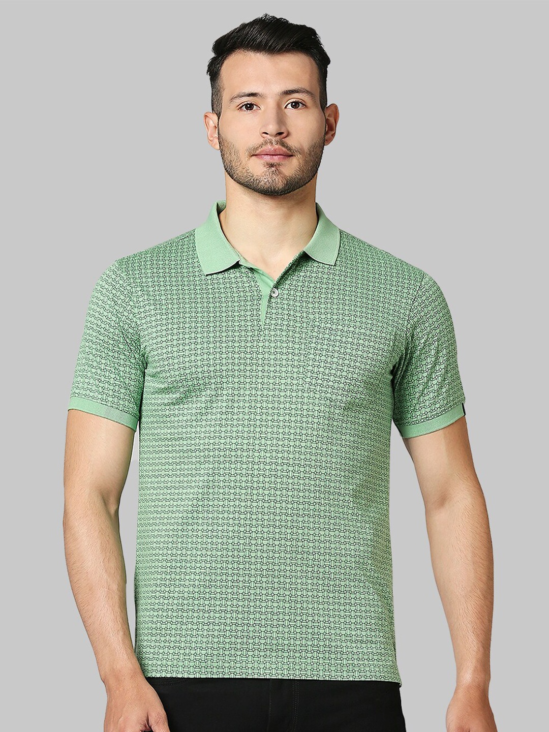 

Raymond Men Green & Black Printed Polo Collar Cotton T-shirt