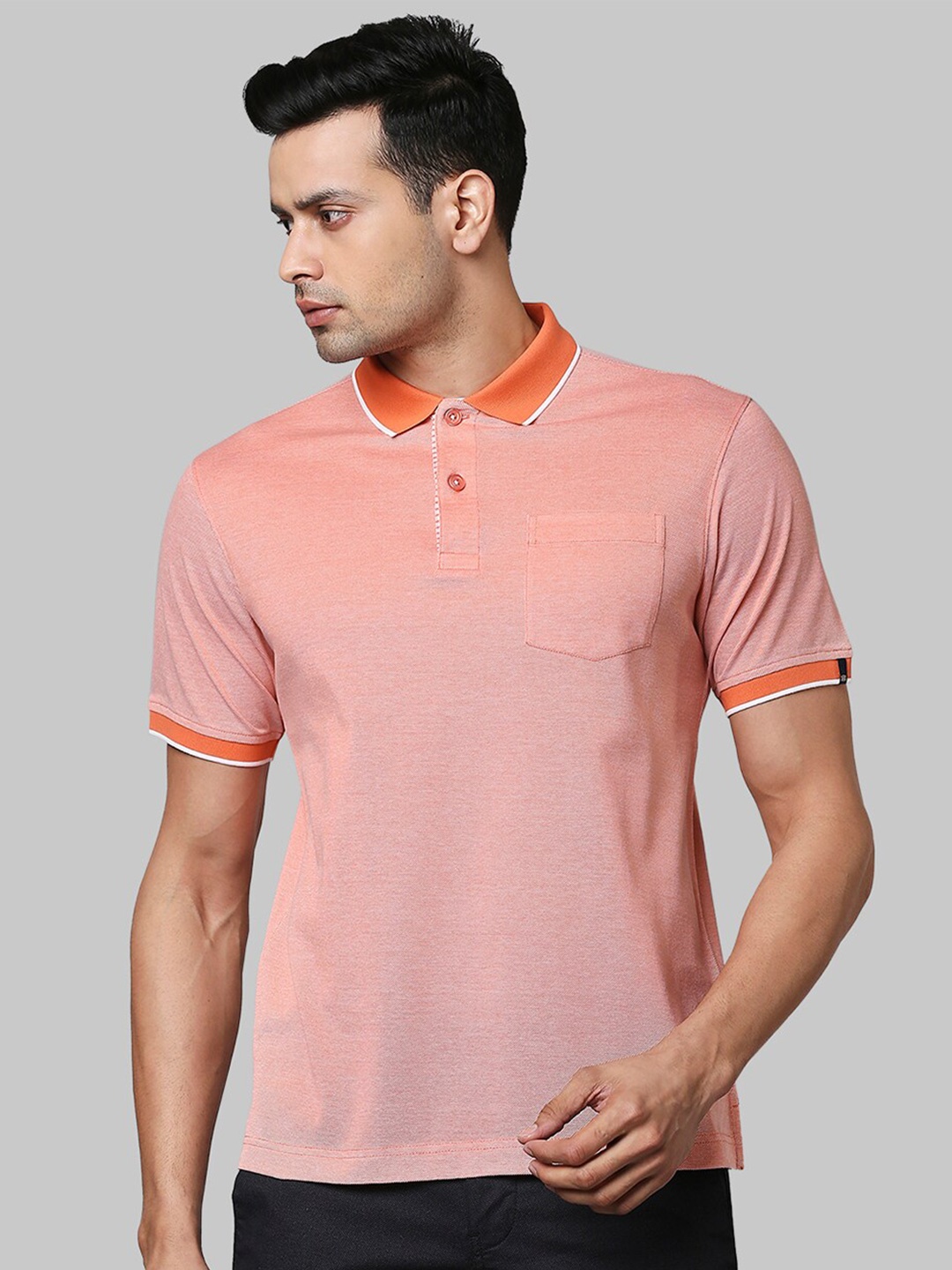 

Raymond Men Orange Solid Cotton Polo Collar T-shirt